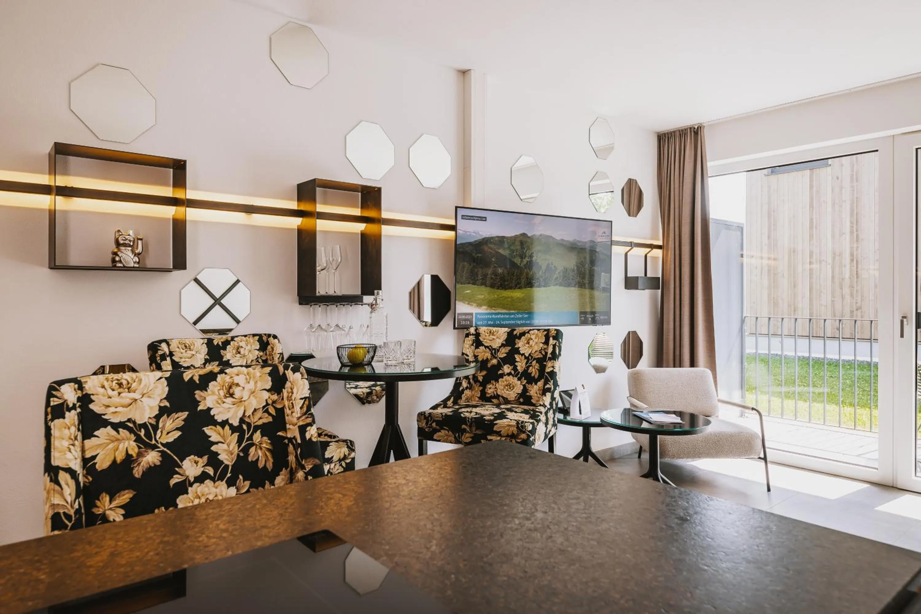 Living room in Nikolaus by AvenidA Panoramic Wellness Suites