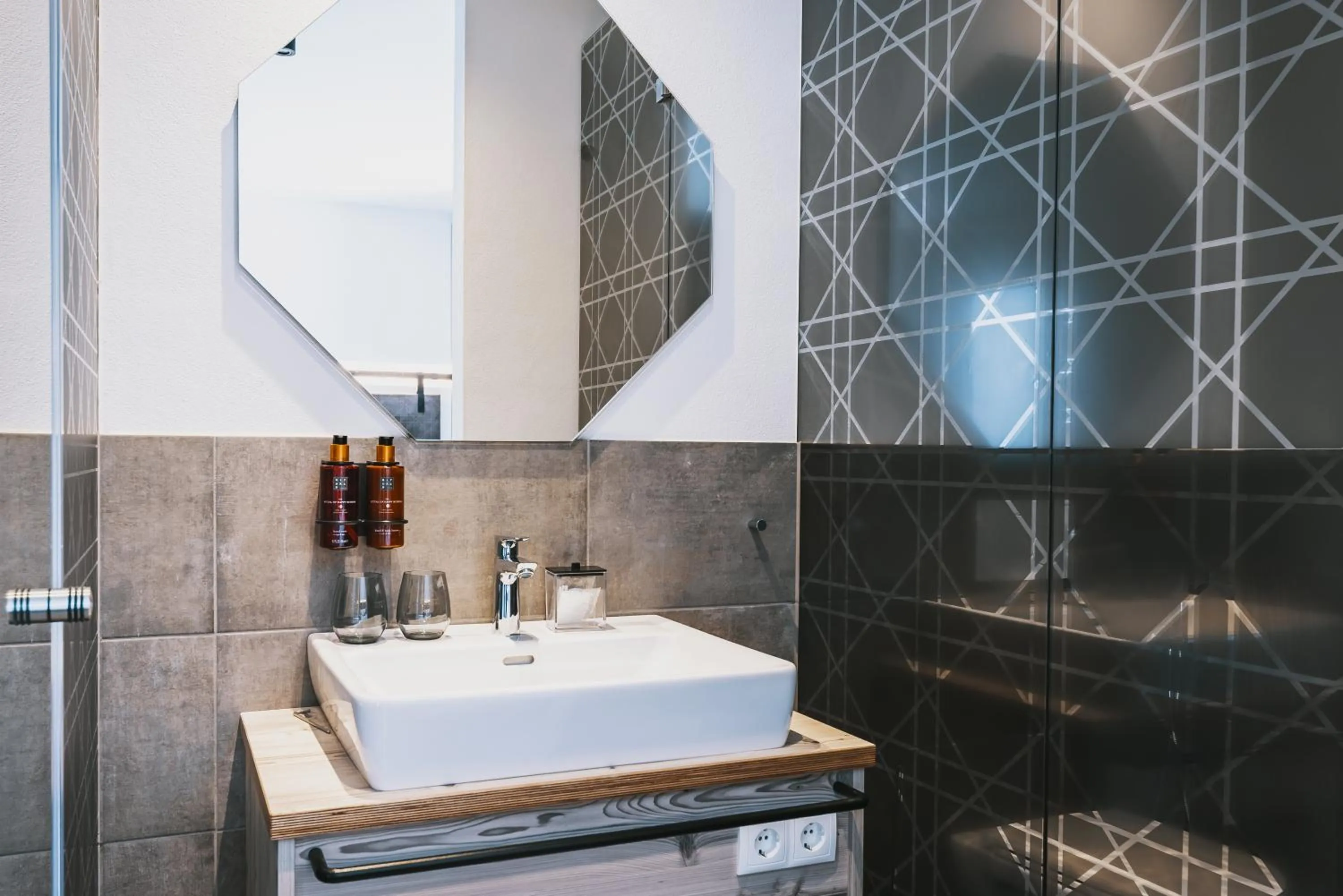 Shower in Nikolaus by AvenidA Panoramic Wellness Suites