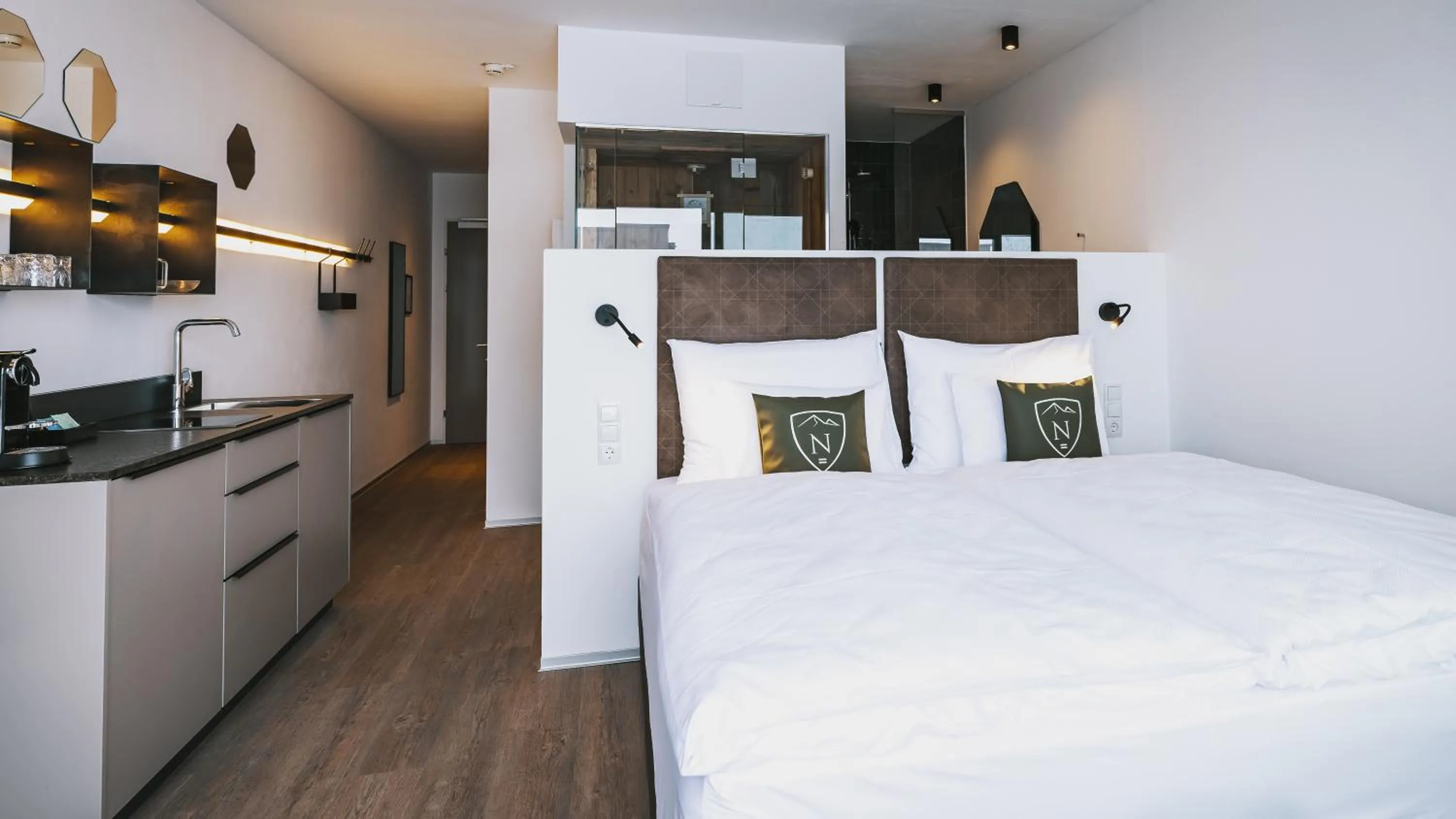 Bed in Nikolaus by AvenidA Panoramic Wellness Suites