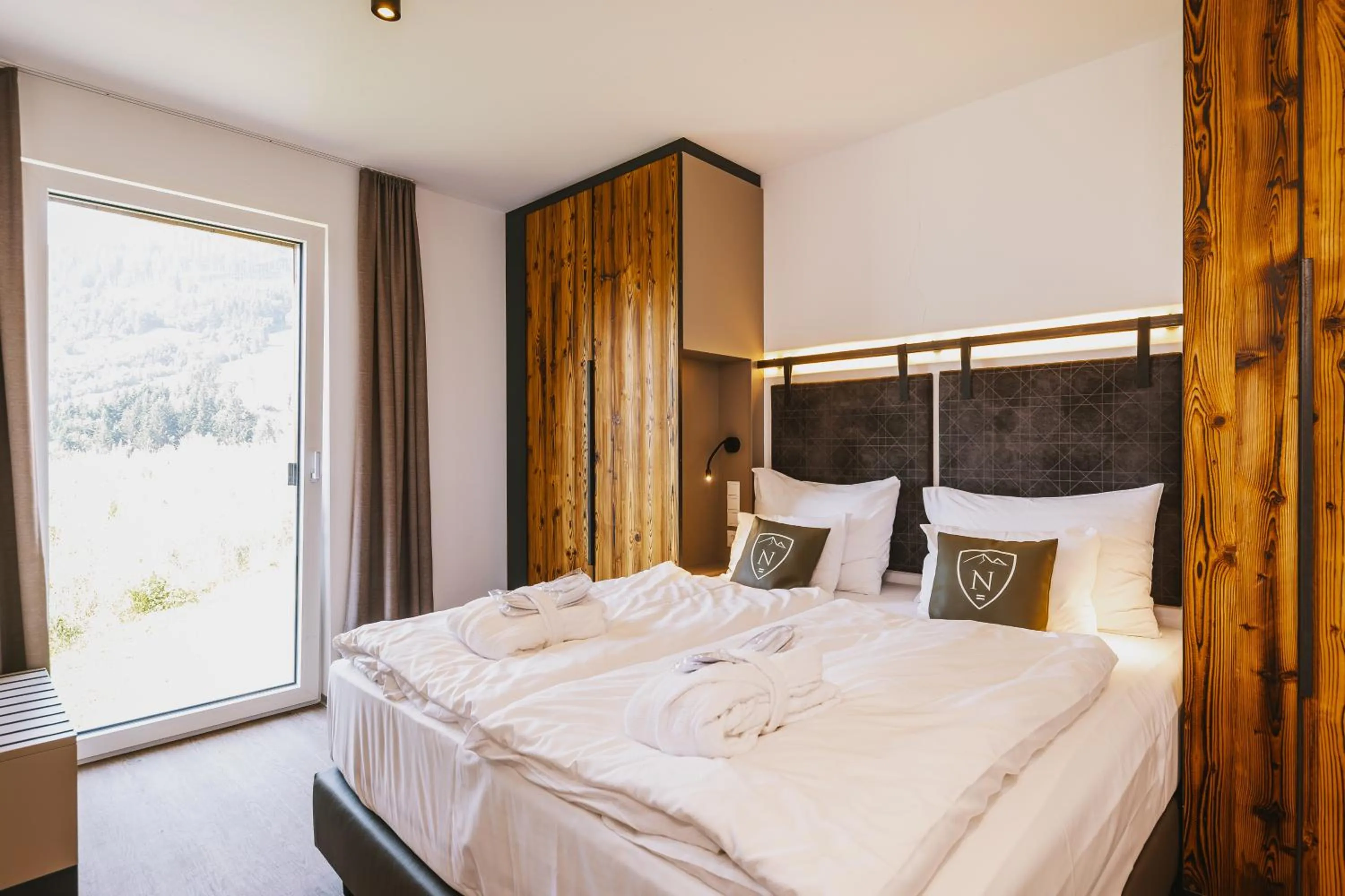 Bedroom, Bed in Nikolaus by AvenidA Panoramic Wellness Suites