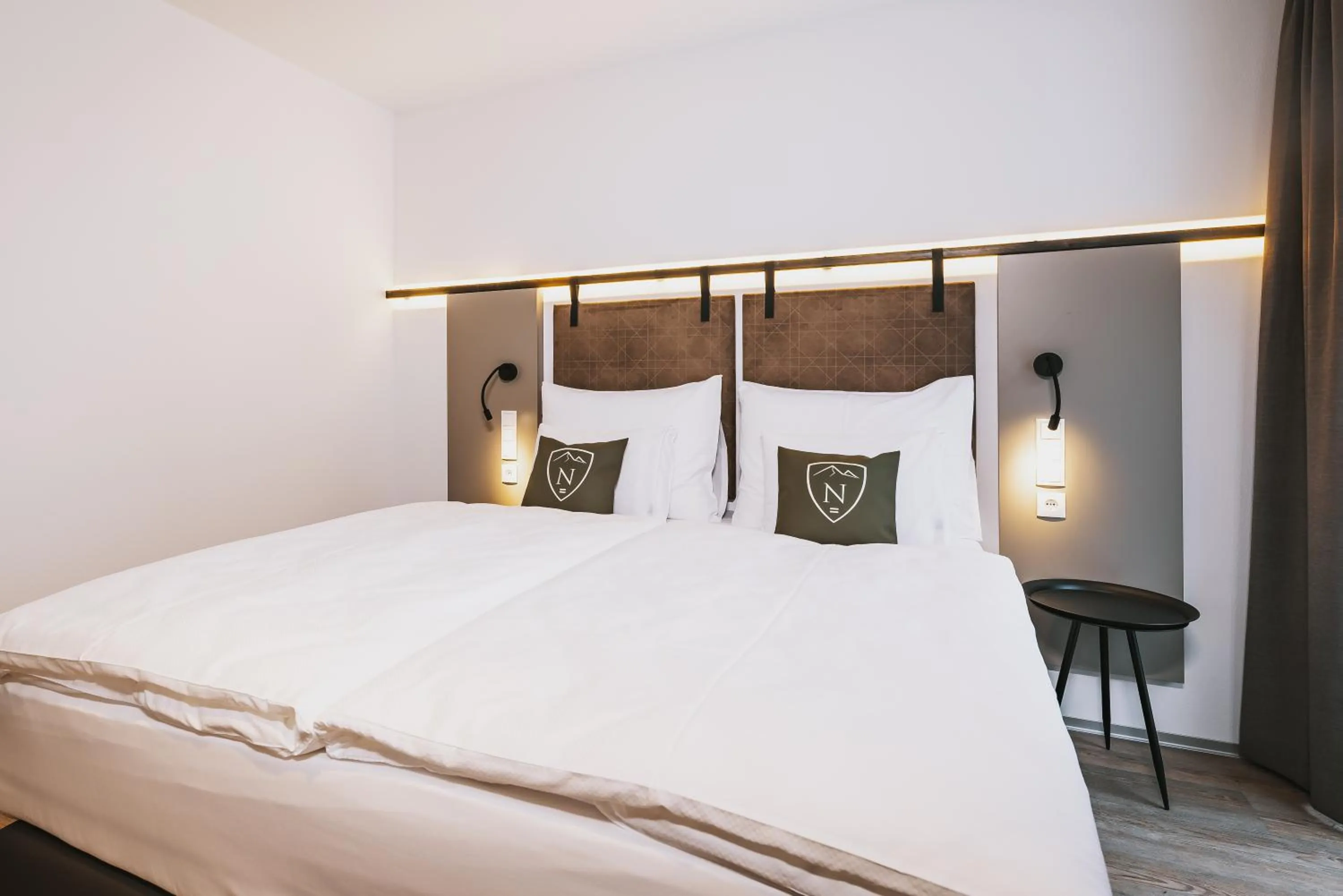 Bedroom, Bed in Nikolaus by AvenidA Panoramic Wellness Suites