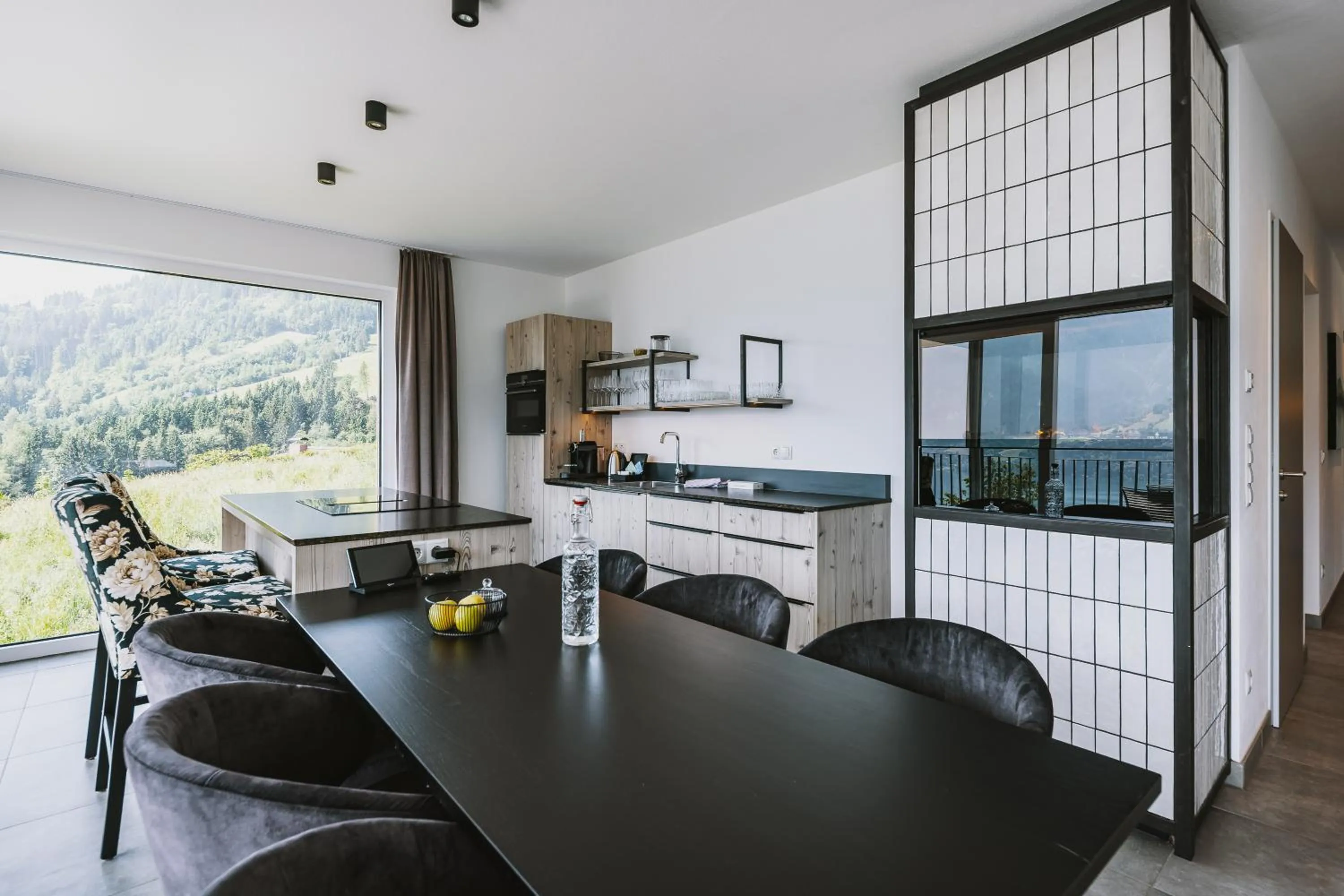 Living room in Nikolaus by AvenidA Panoramic Wellness Suites