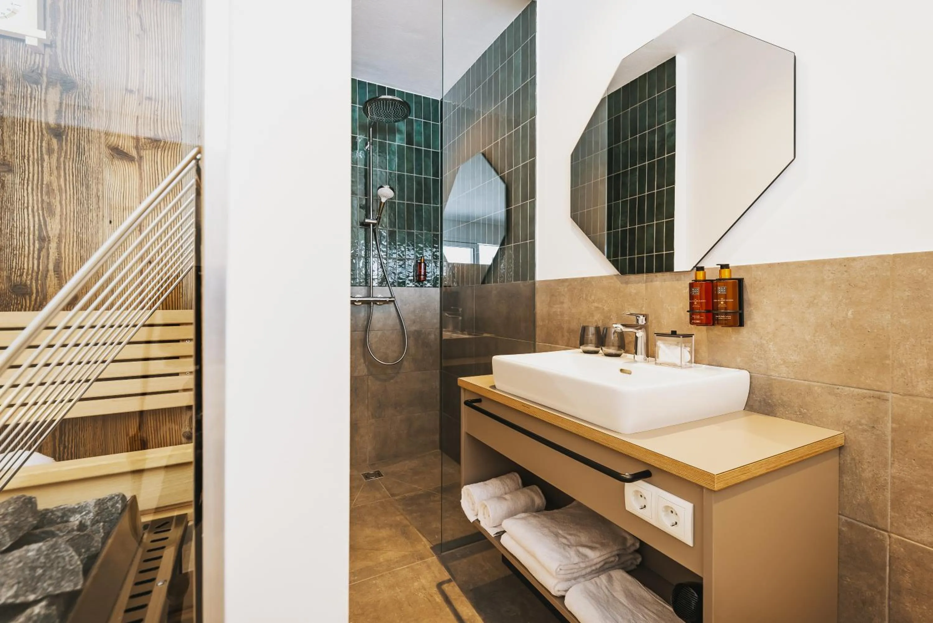 Shower in Nikolaus by AvenidA Panoramic Wellness Suites