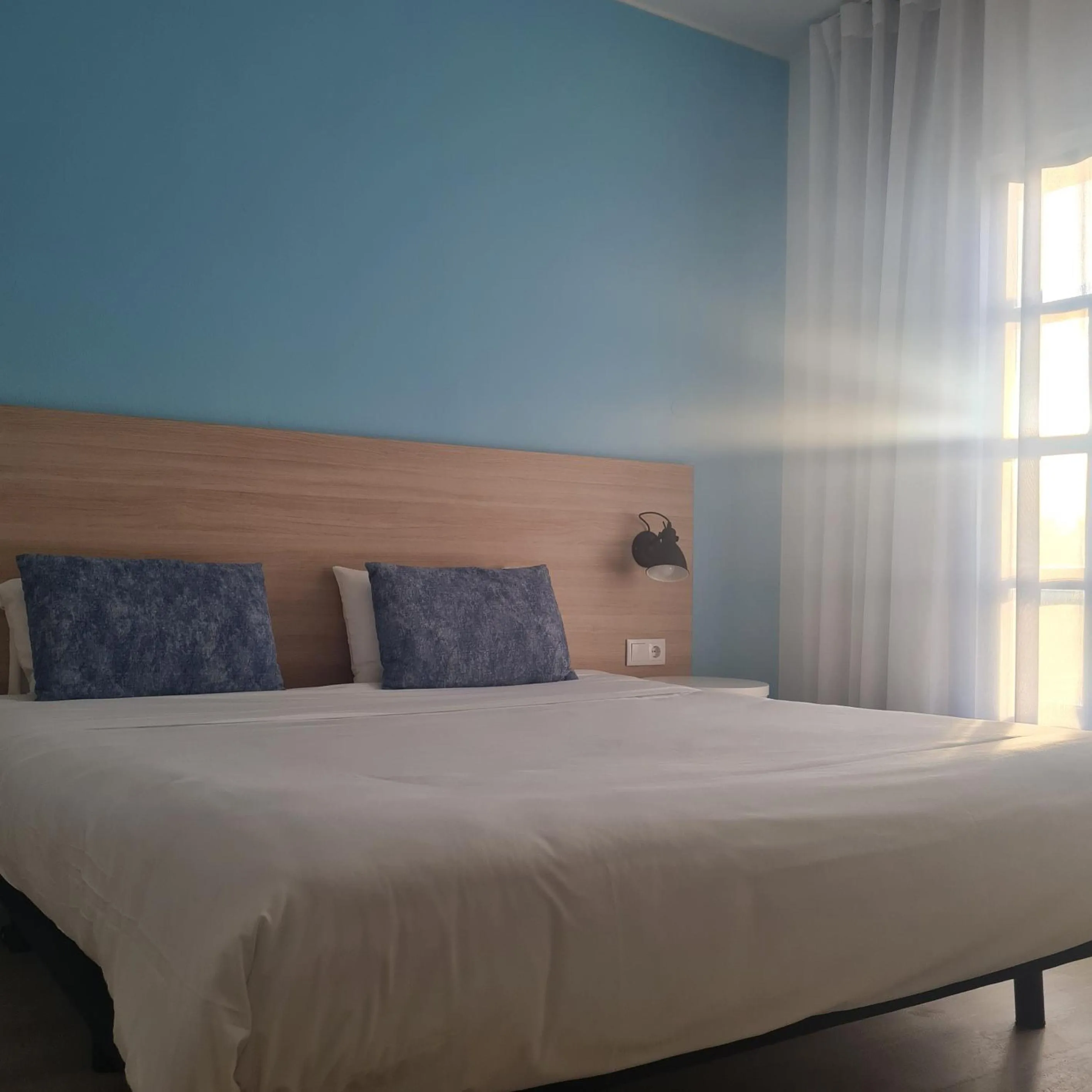 Photo of the whole room, Bed in Flag Hotel Santarém