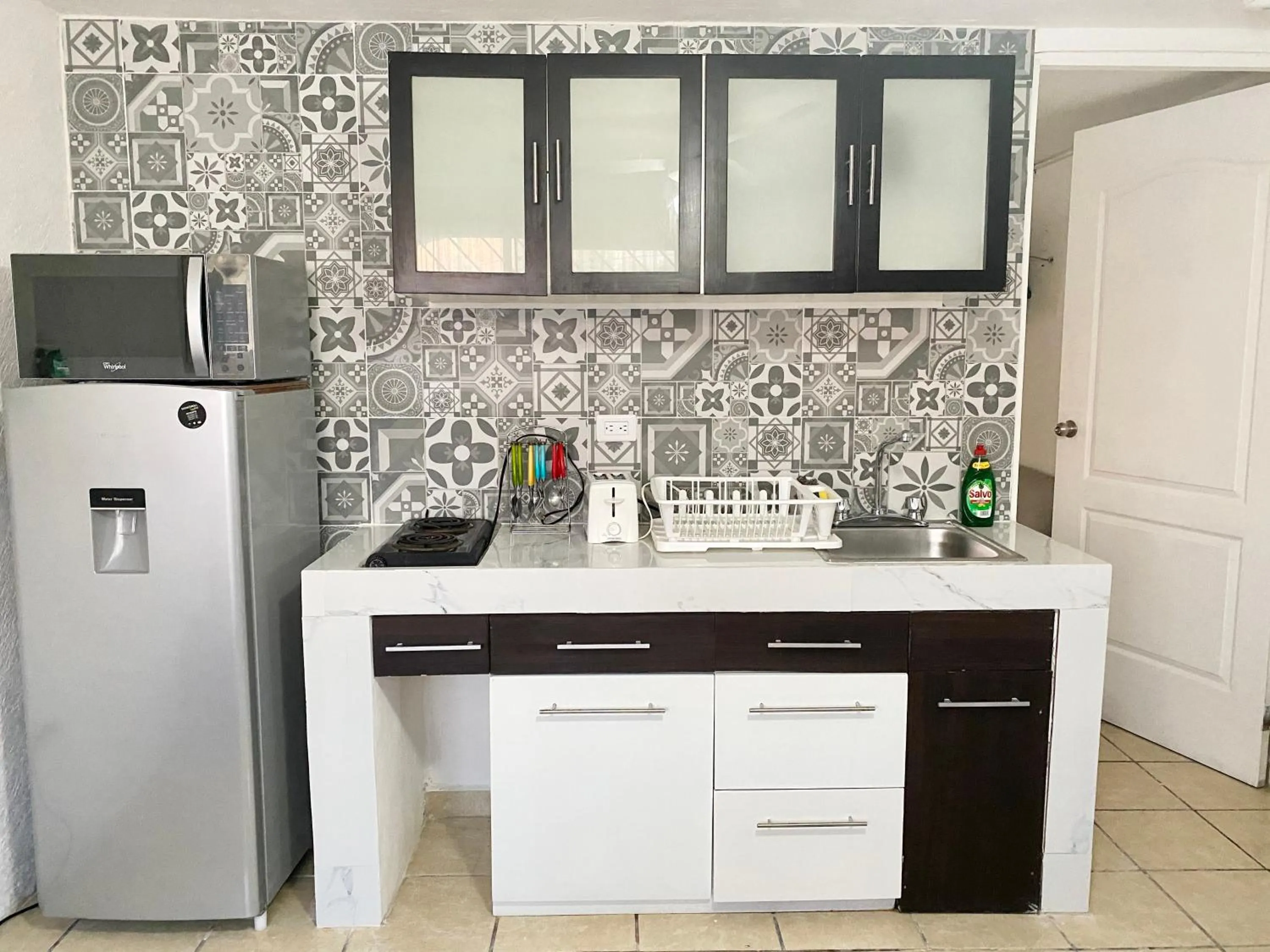 Kitchen or kitchenette in Coco Suites by Andiani Travel