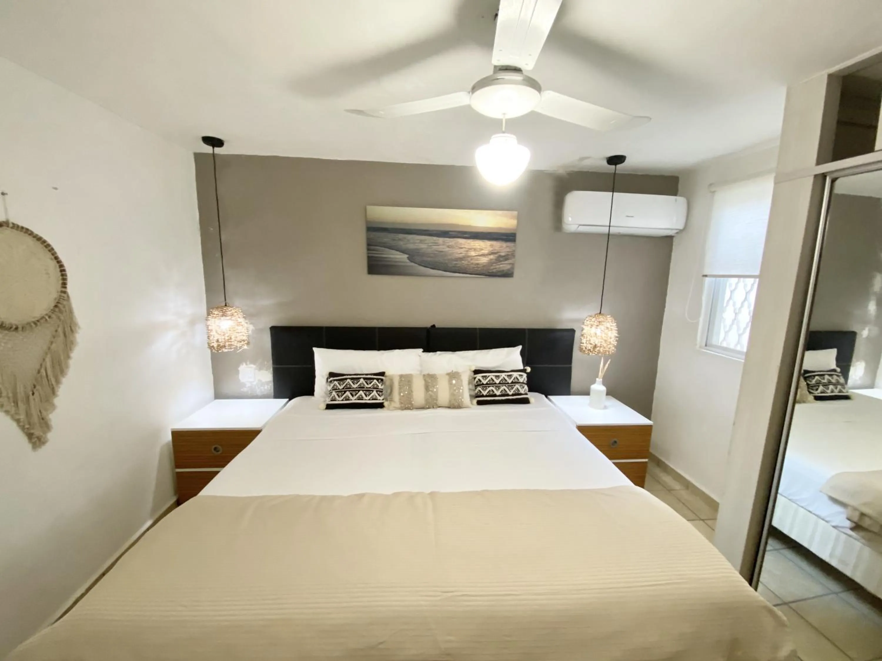 Photo of the whole room, Bed in Coco Suites by Andiani Travel