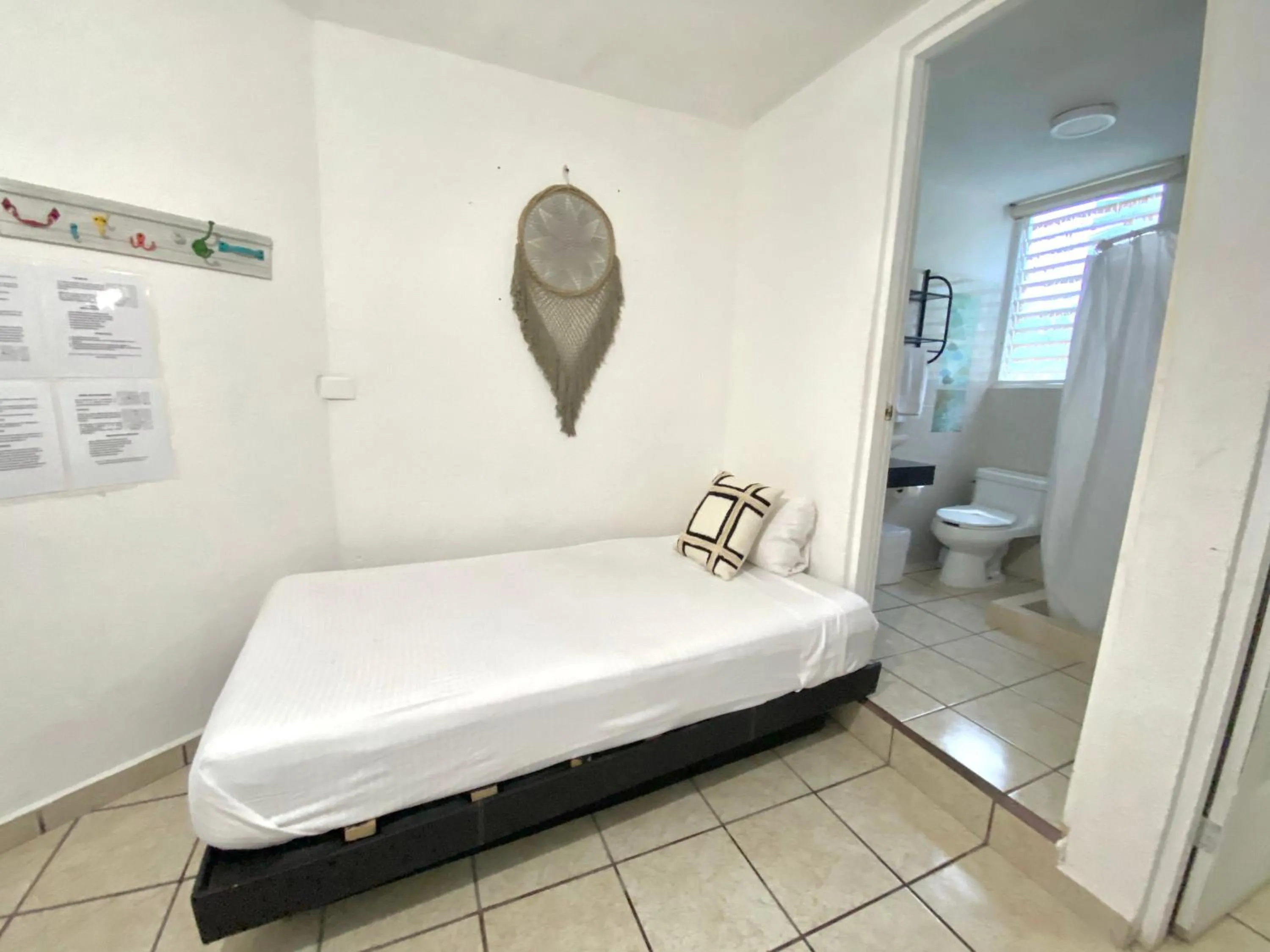 Photo of the whole room, Bed in Coco Suites by Andiani Travel