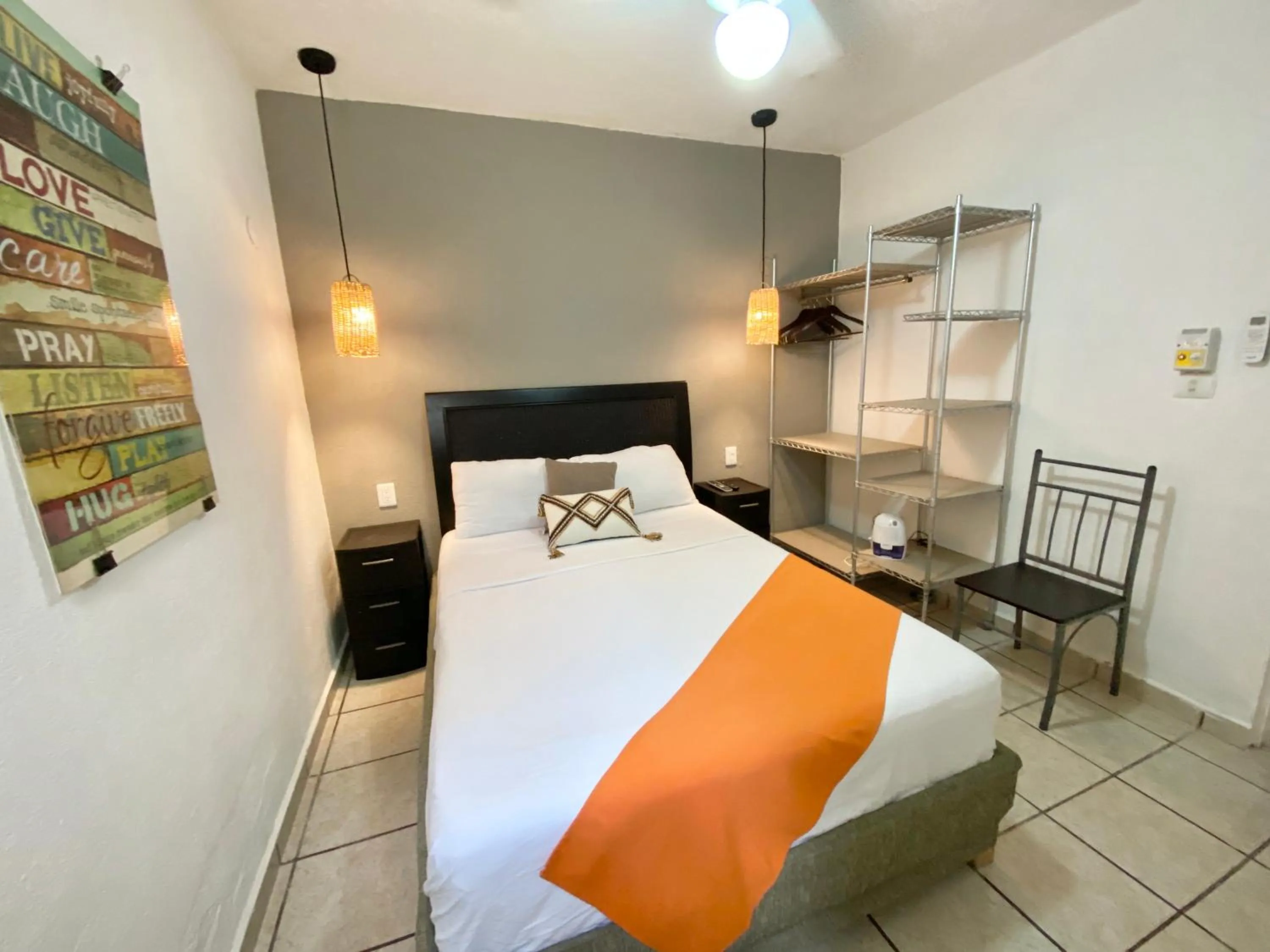 Photo of the whole room, Bed in Coco Suites by Andiani Travel