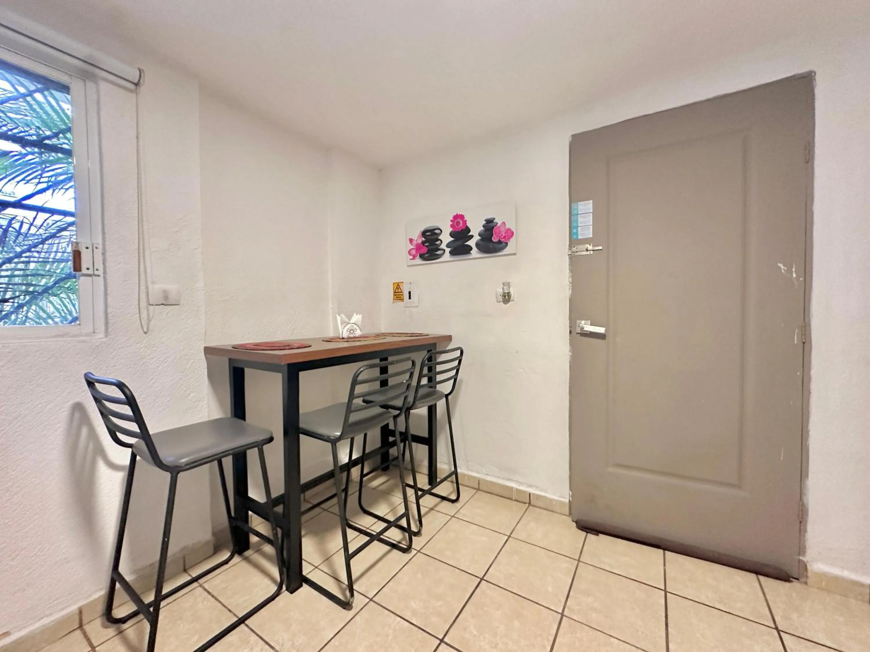 Dining area in Coco Suites by Andiani Travel