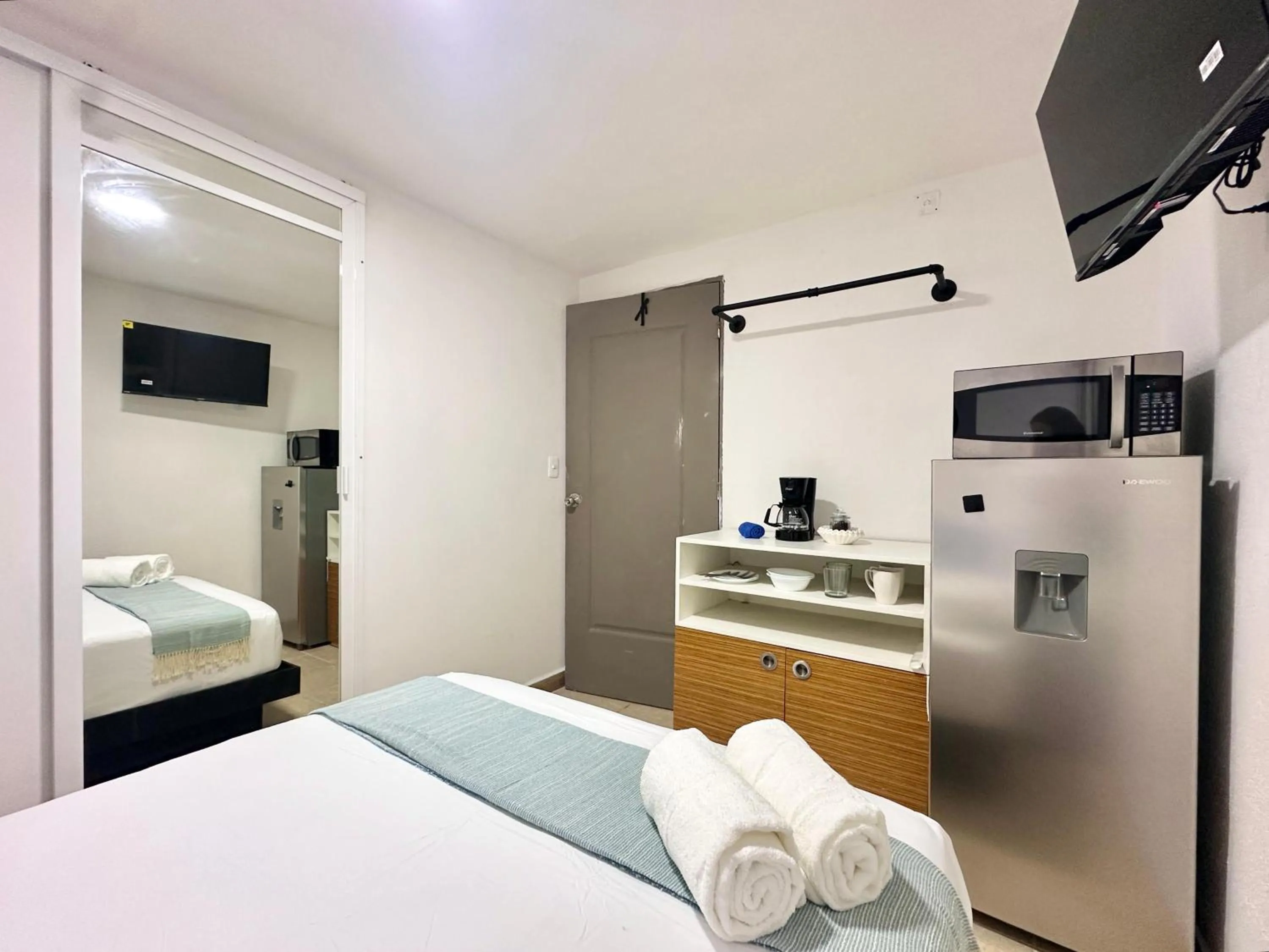 TV and multimedia, Bed in Coco Suites by Andiani Travel