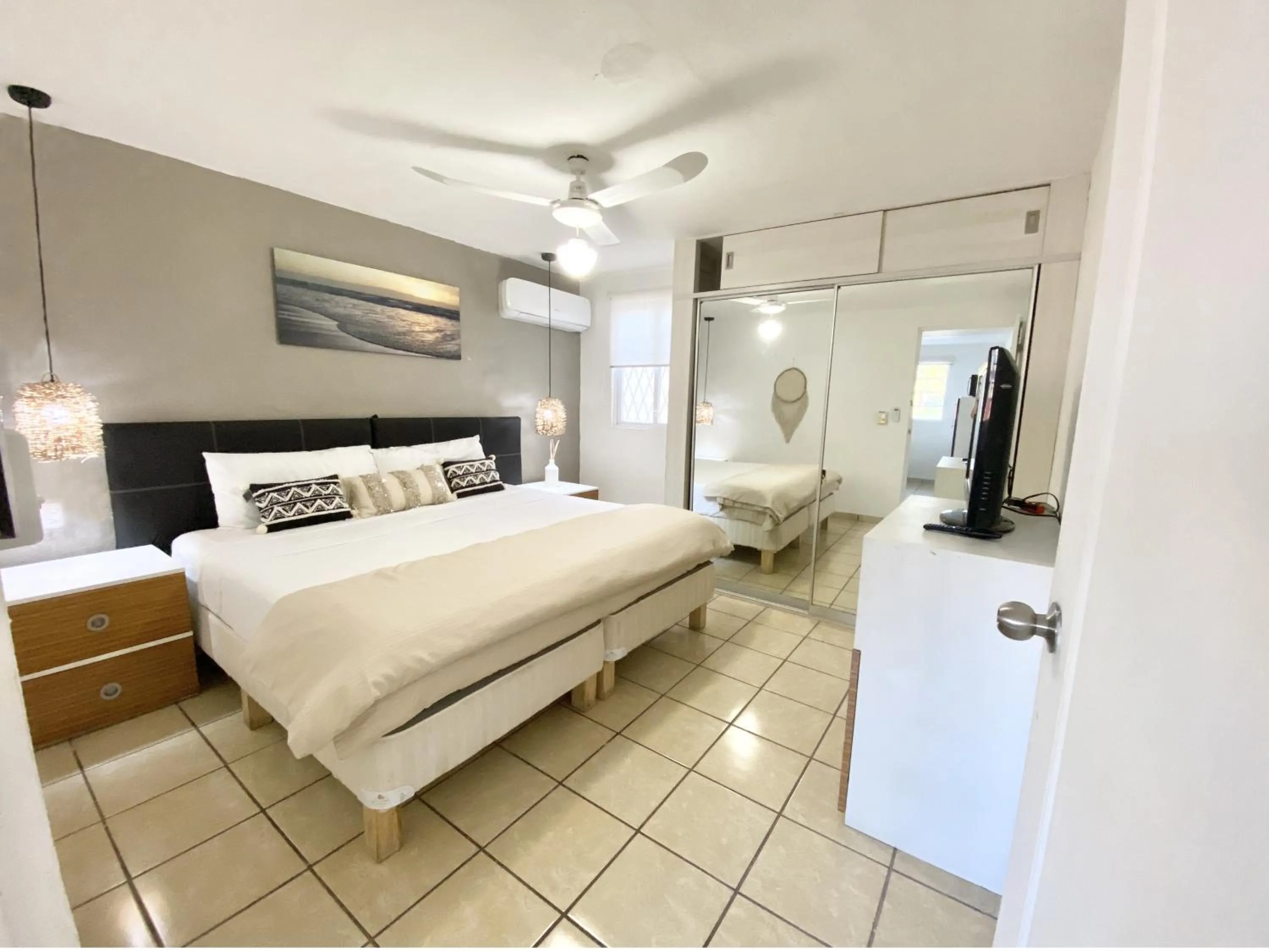 Photo of the whole room, Bed in Coco Suites by Andiani Travel