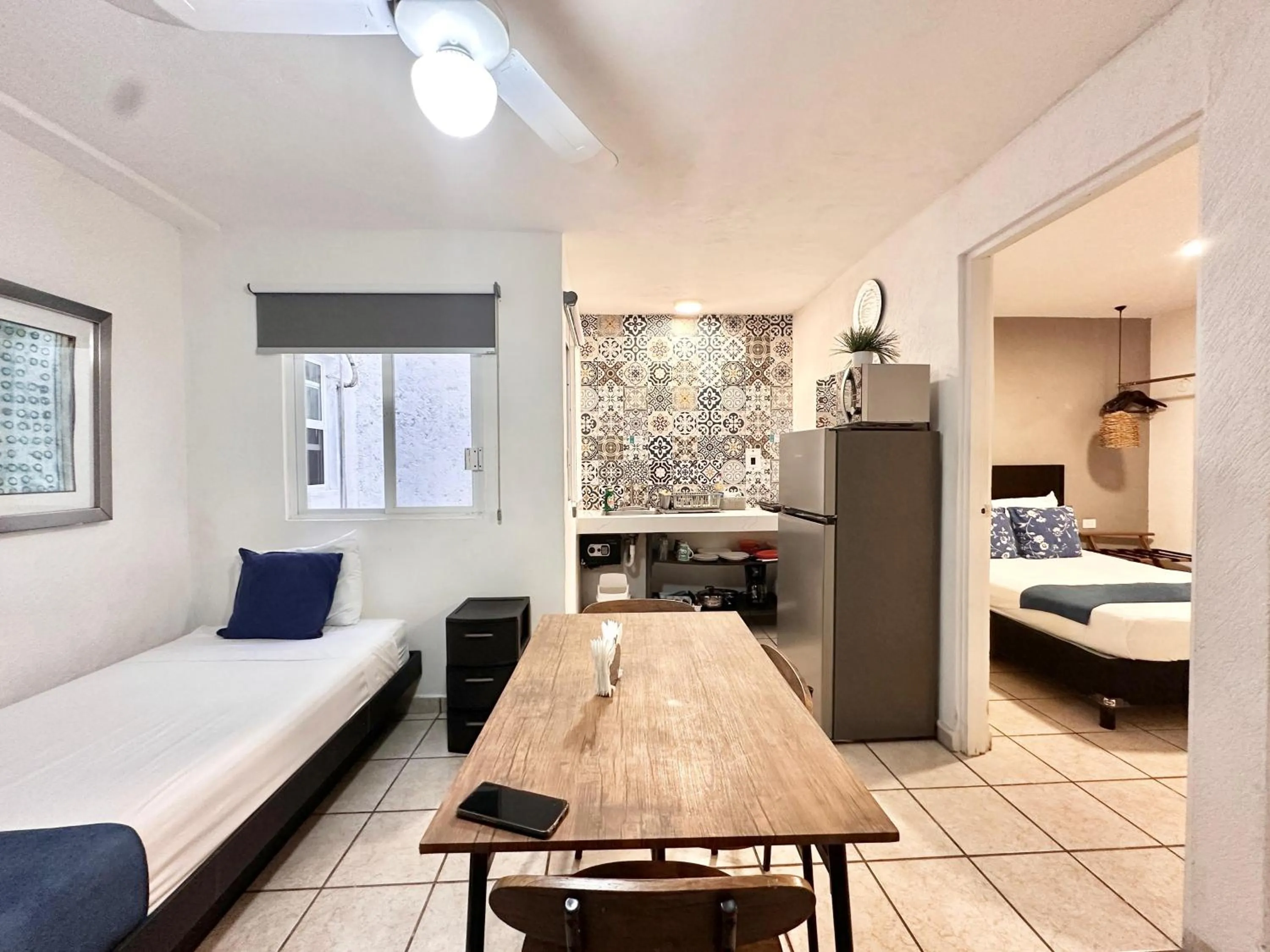 Kitchen or kitchenette, Bed in Coco Suites by Andiani Travel