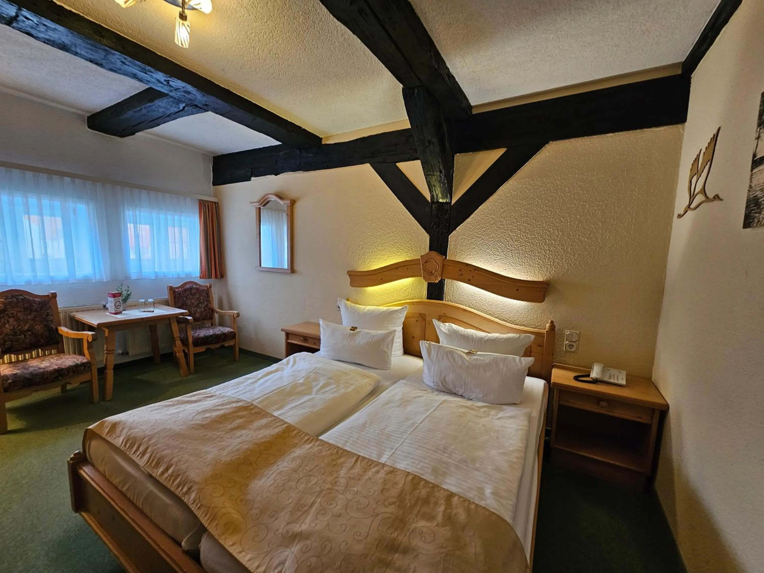 Bed in Hotel Am Markt & Brauhaus Stadtkrug
