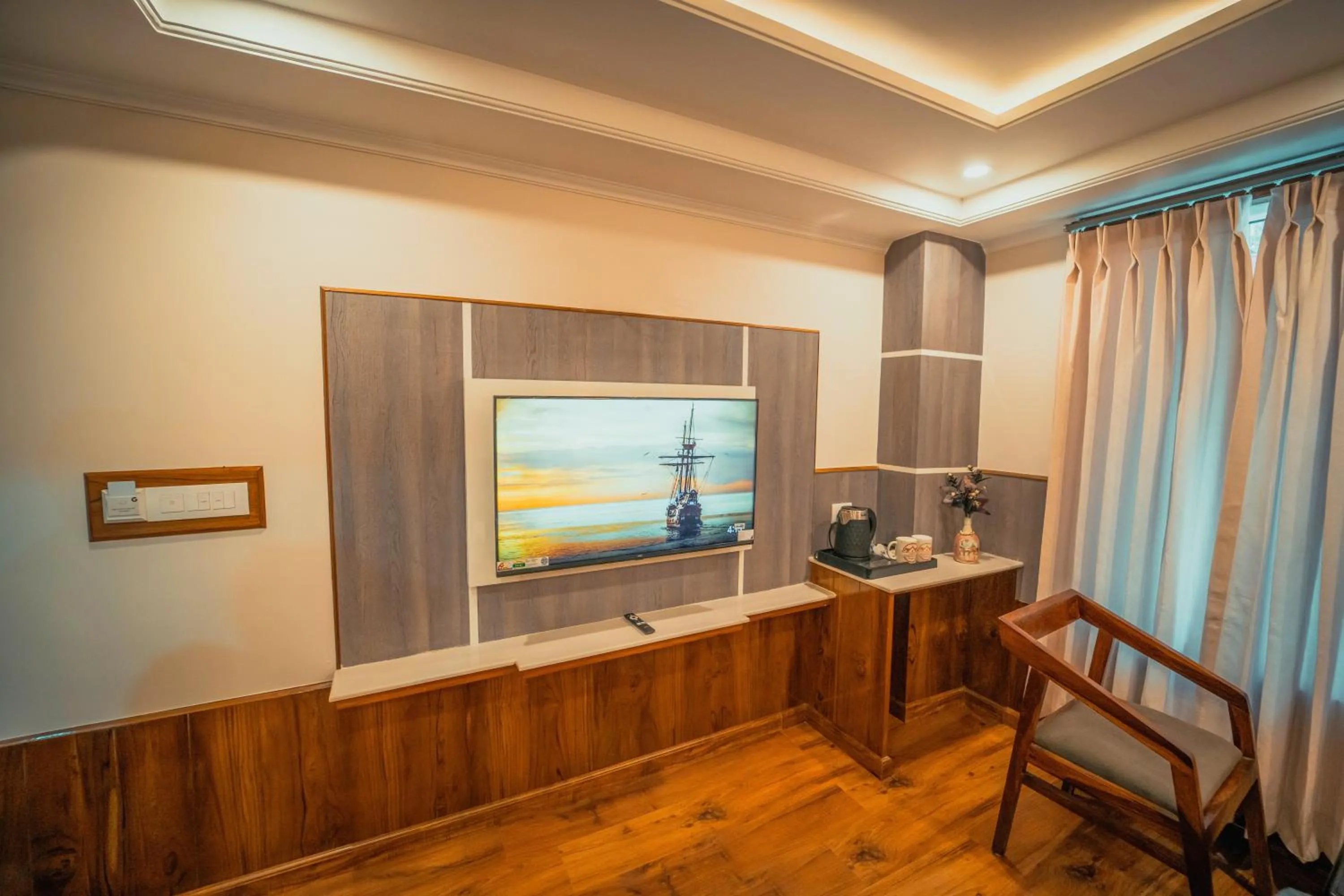 TV and multimedia in Singhs BnB by Lazy Getaways