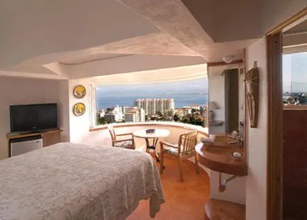 Queen Room with Garden View in Casa Isabel a Boutique Hilltop Inn
