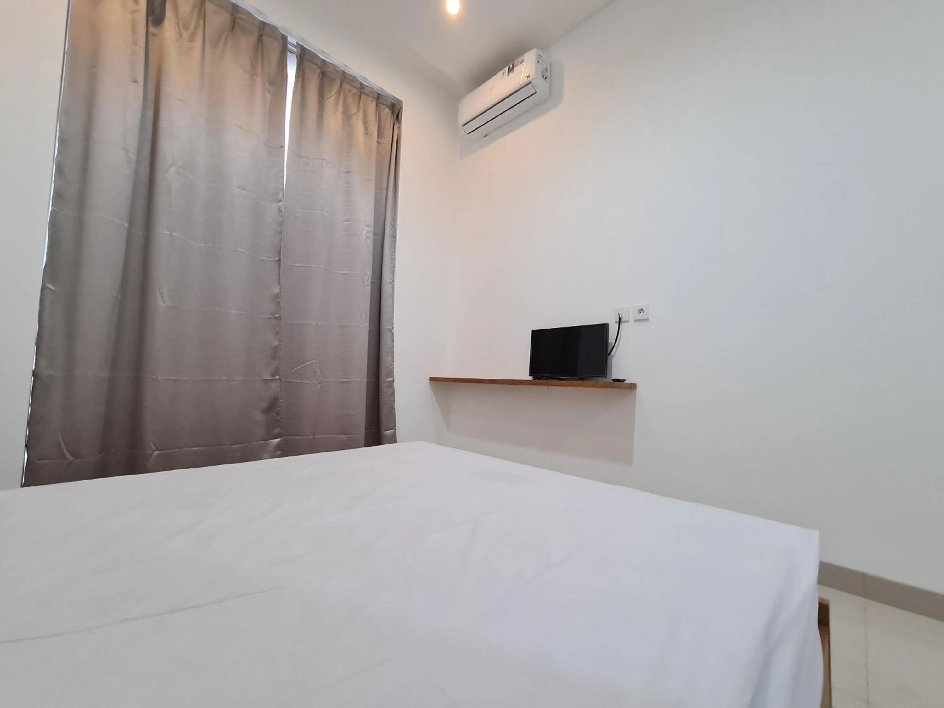 Bed in Graha Martadinata Syariah Mitra RedDoorz