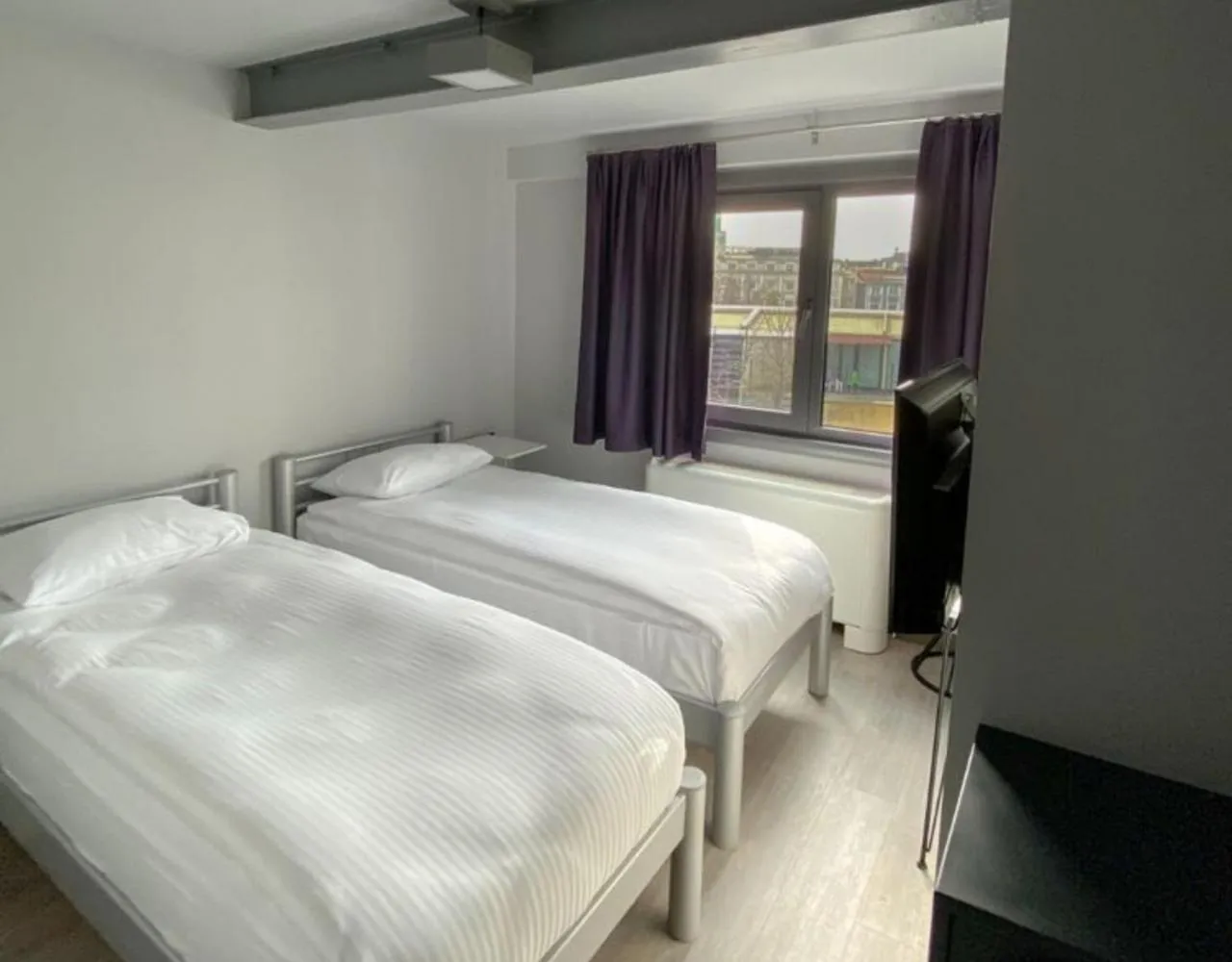 Bed in Eresin Hotels Express