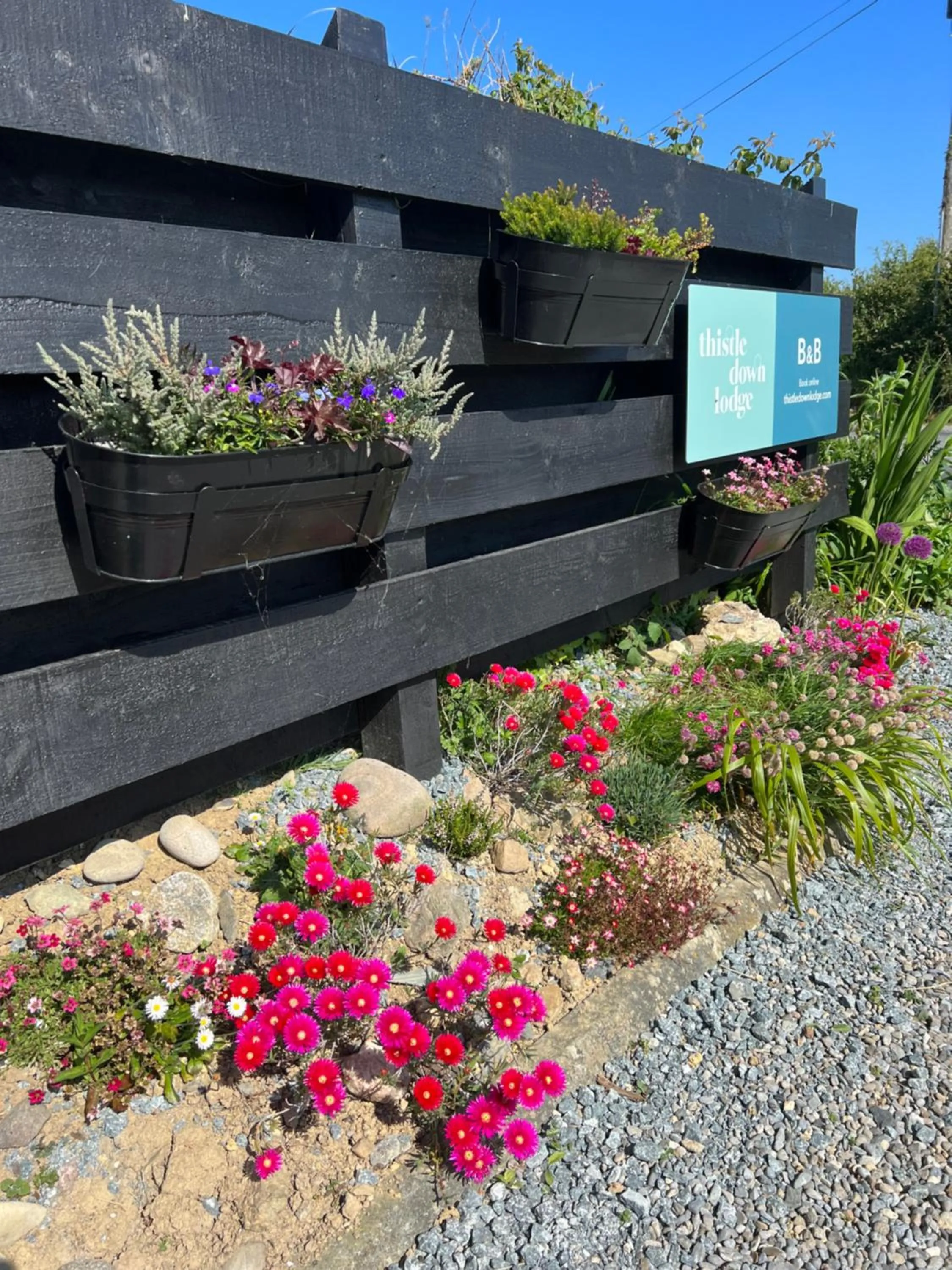 Property logo or sign in Thistledown Lodge