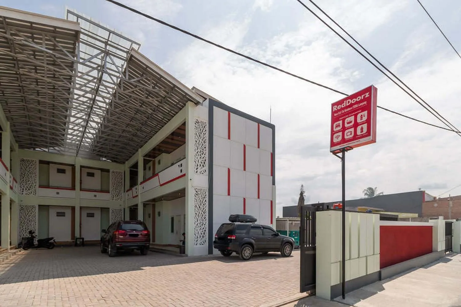 Property logo or sign in RedDoorz near Exit Tol Kotabaru ITERA Lampung