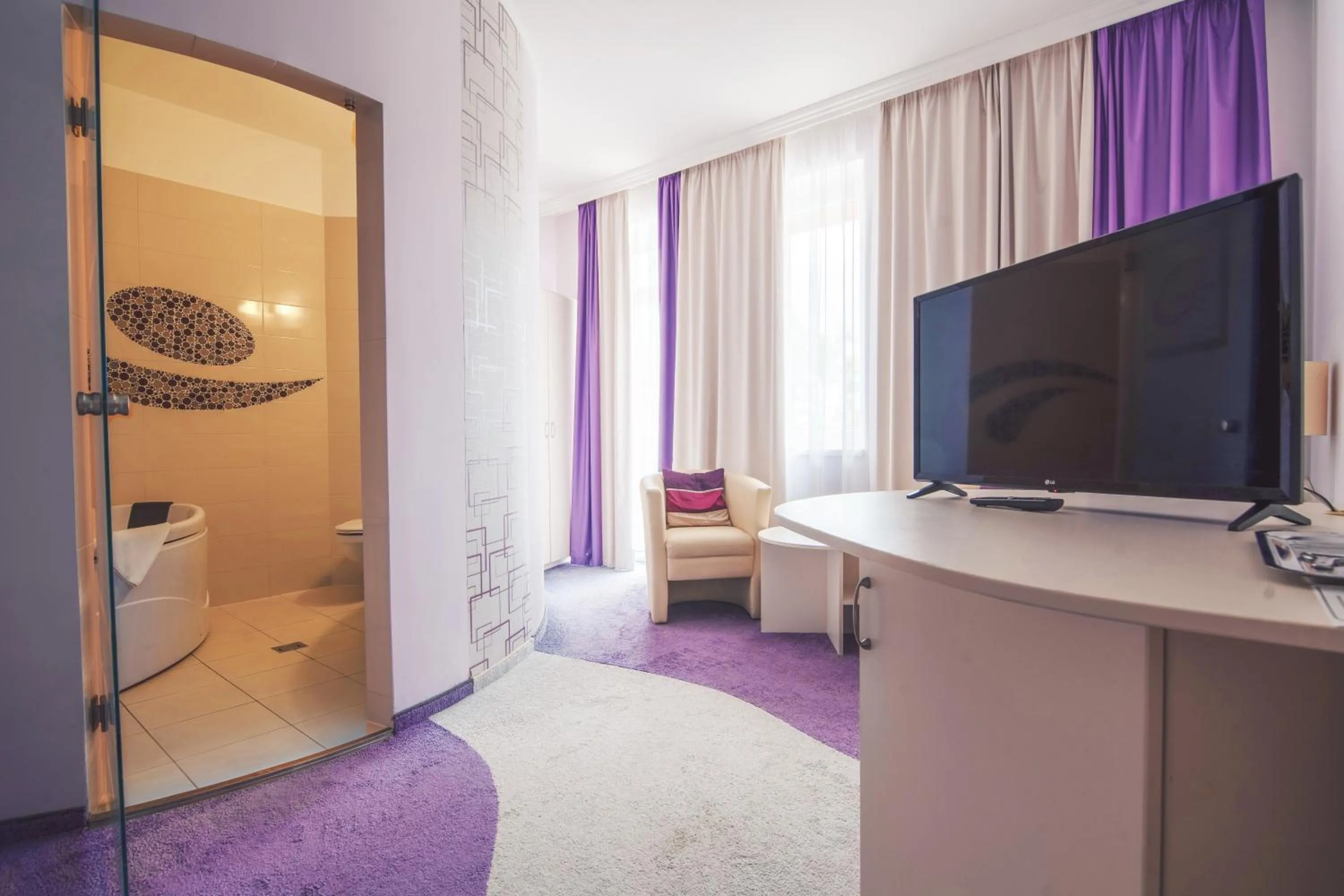 Bedroom in Granada Conference, Wellness and Sport Hotel