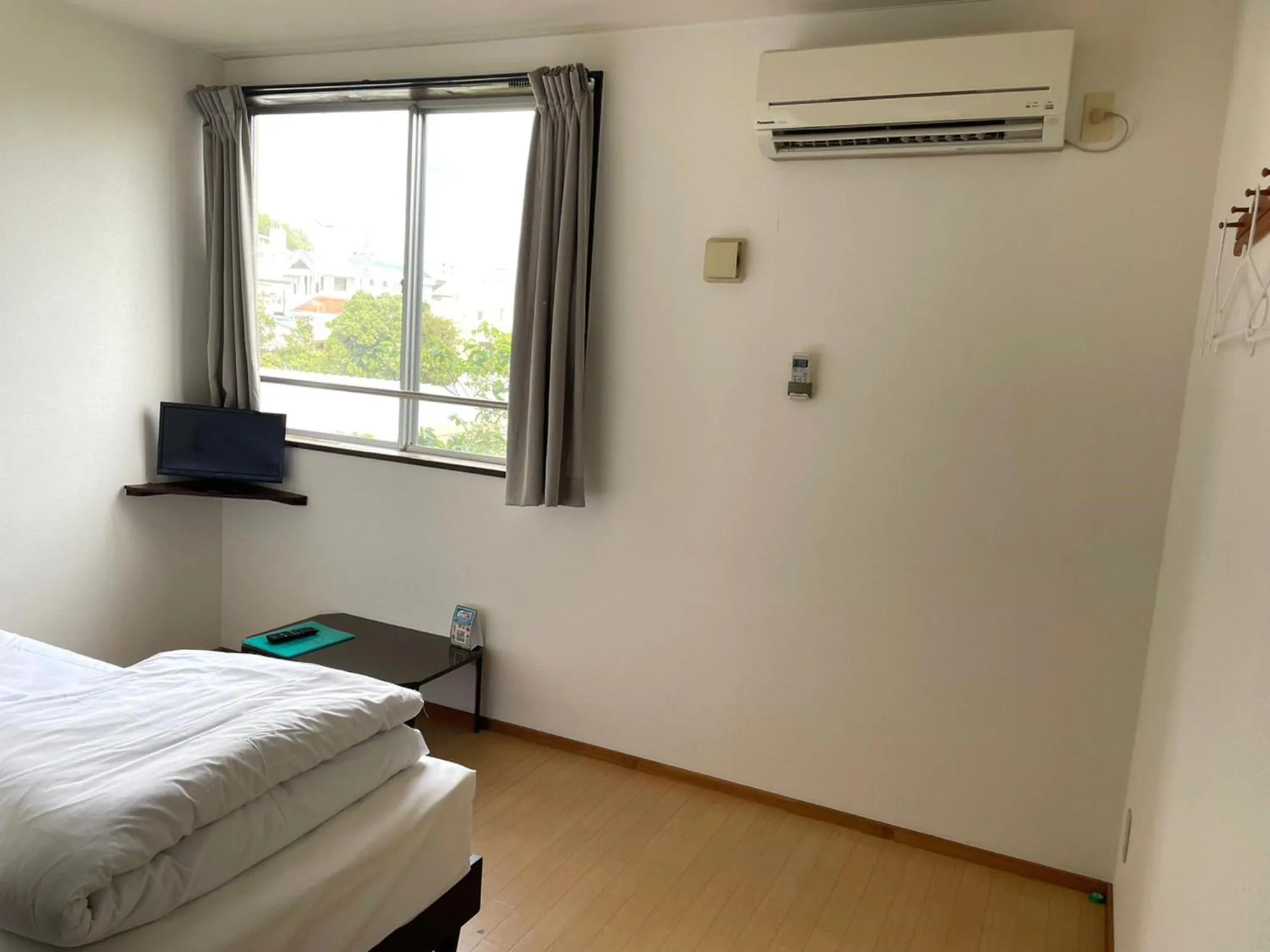 Photo of the whole room, Bed in Southern Village Okinawa