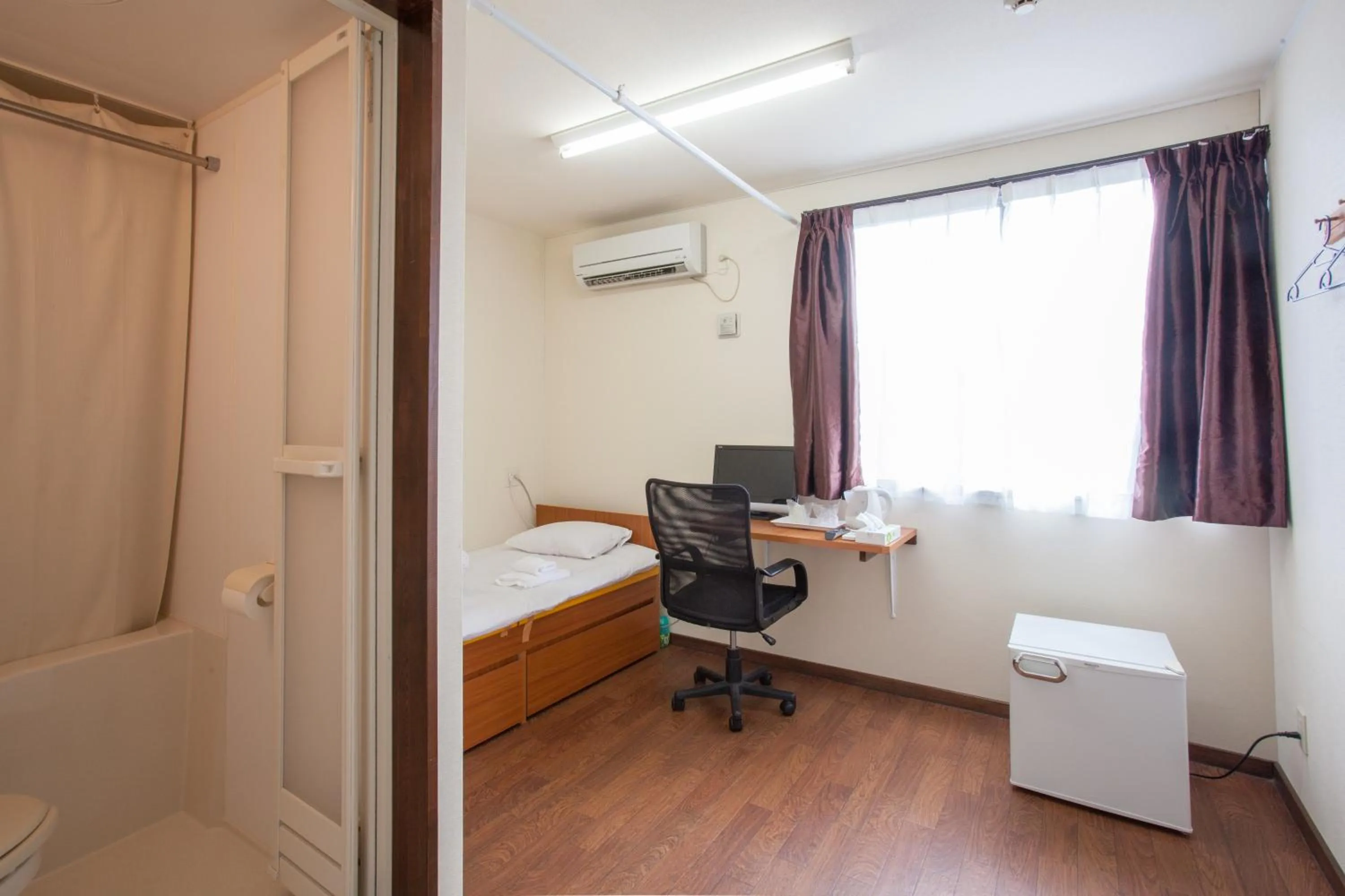 Photo of the whole room, Bed in Southern Village Okinawa