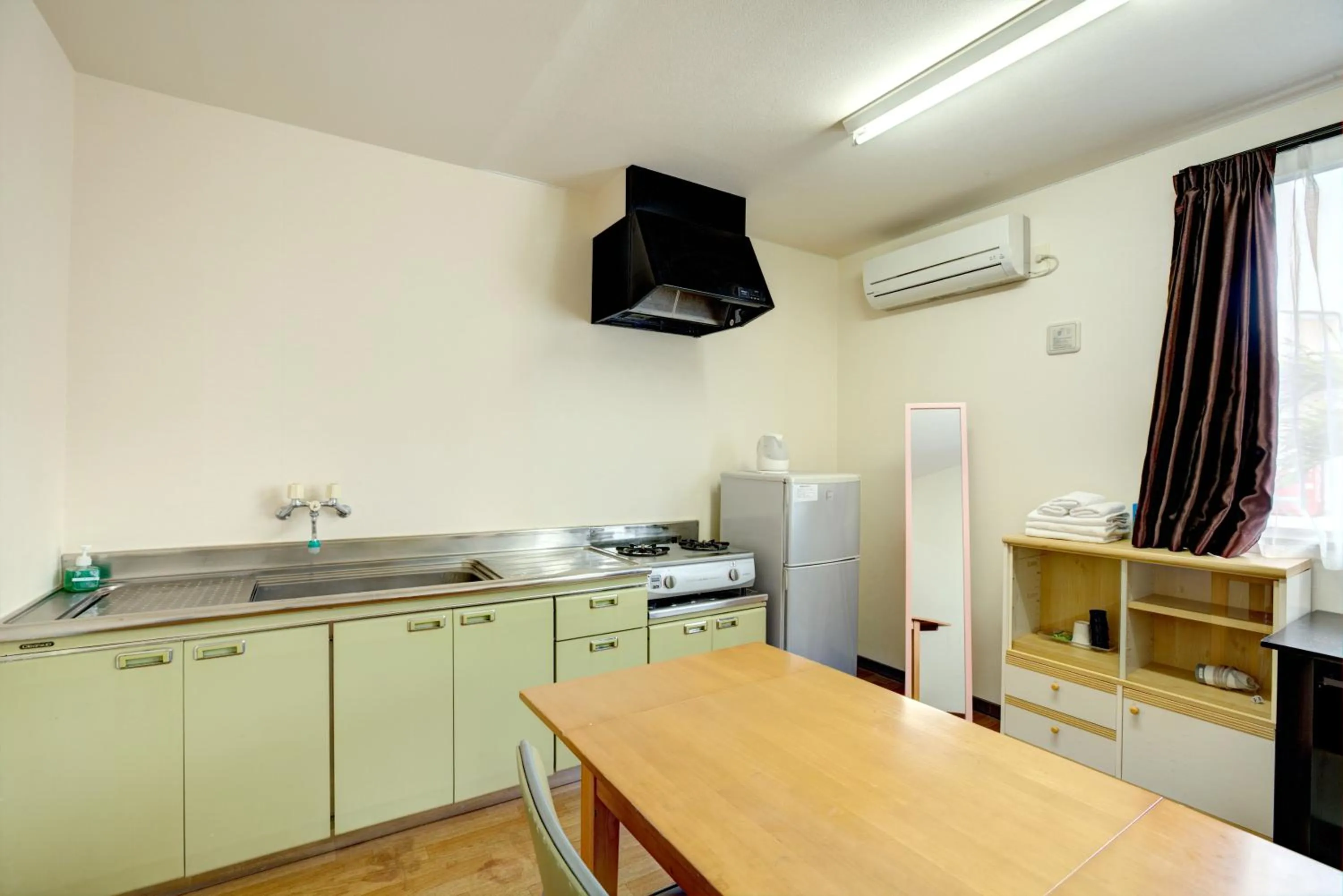 Kitchen or kitchenette in Southern Village Okinawa