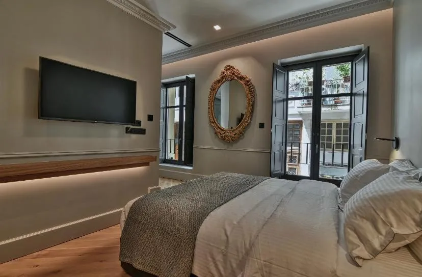 Bed in Nikiou Suites Luxury Residence