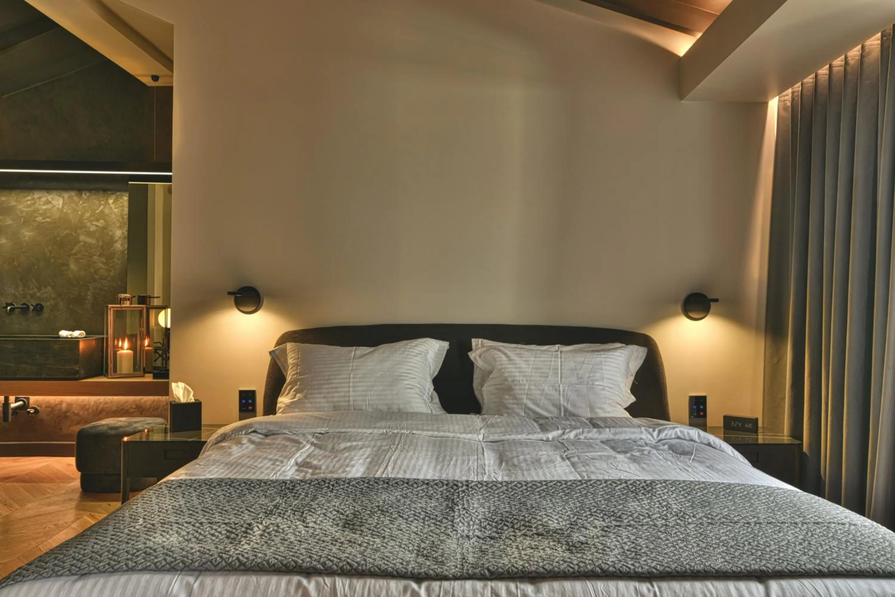Bed in Nikiou Suites Luxury Residence