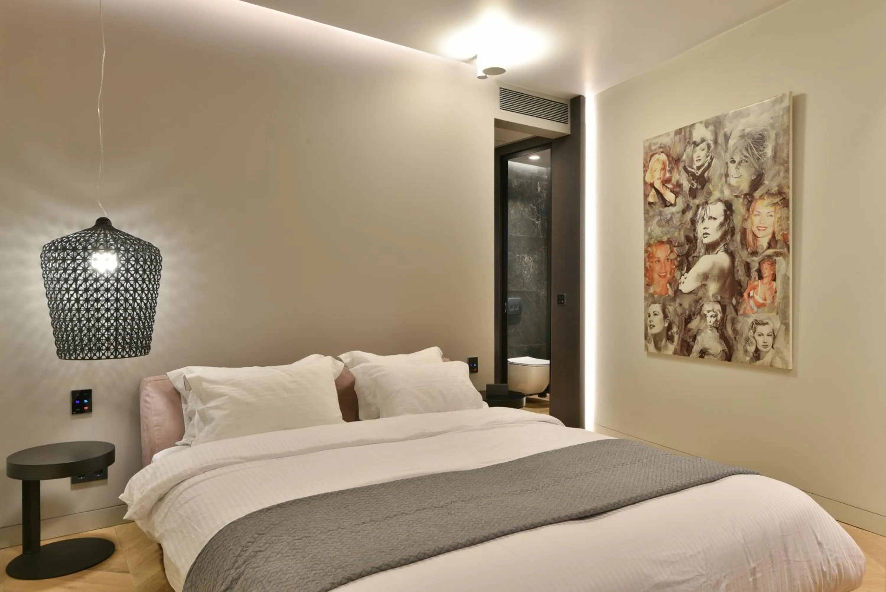 Bed in Nikiou Suites Luxury Residence