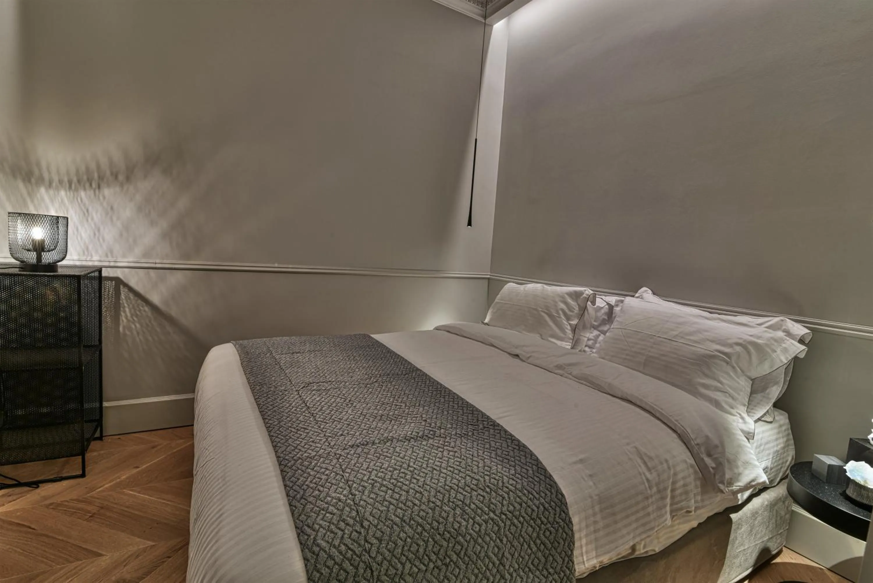 Bed in Nikiou Suites Luxury Residence