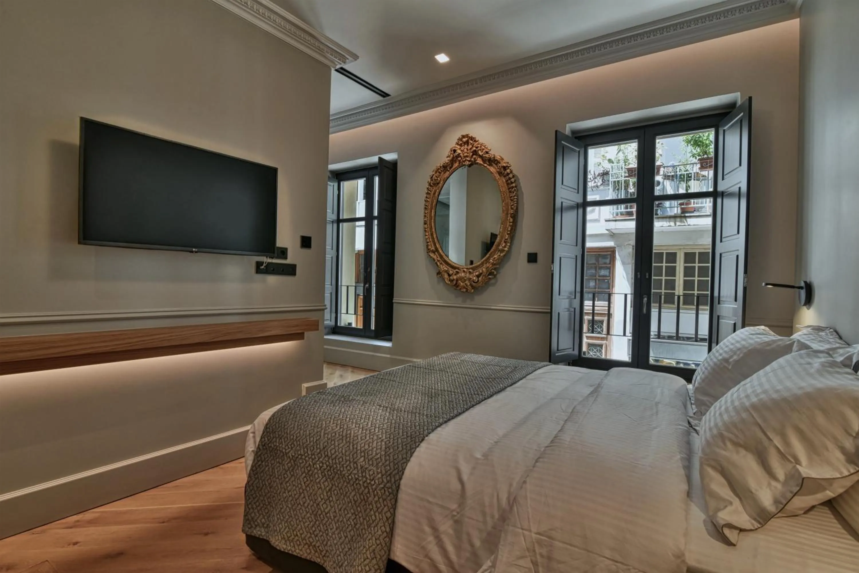 Bed in Nikiou Suites Luxury Residence