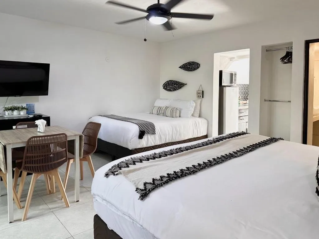 Photo of the whole room, Bed in Sole & Mare by Andiani Travel