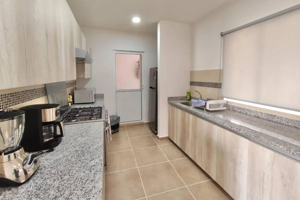 Kitchen or kitchenette in Dreams Lagoon by Andiani Travel