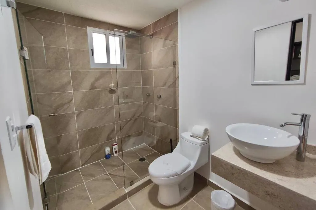 Shower in Dreams Lagoon by Andiani Travel