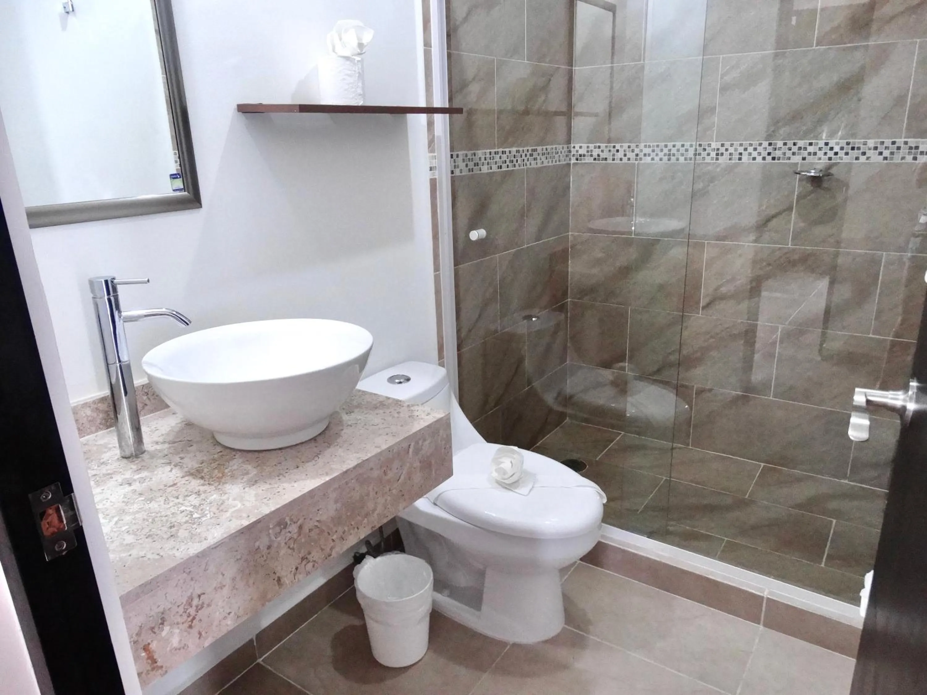 Shower in Dreams Lagoon by Andiani Travel