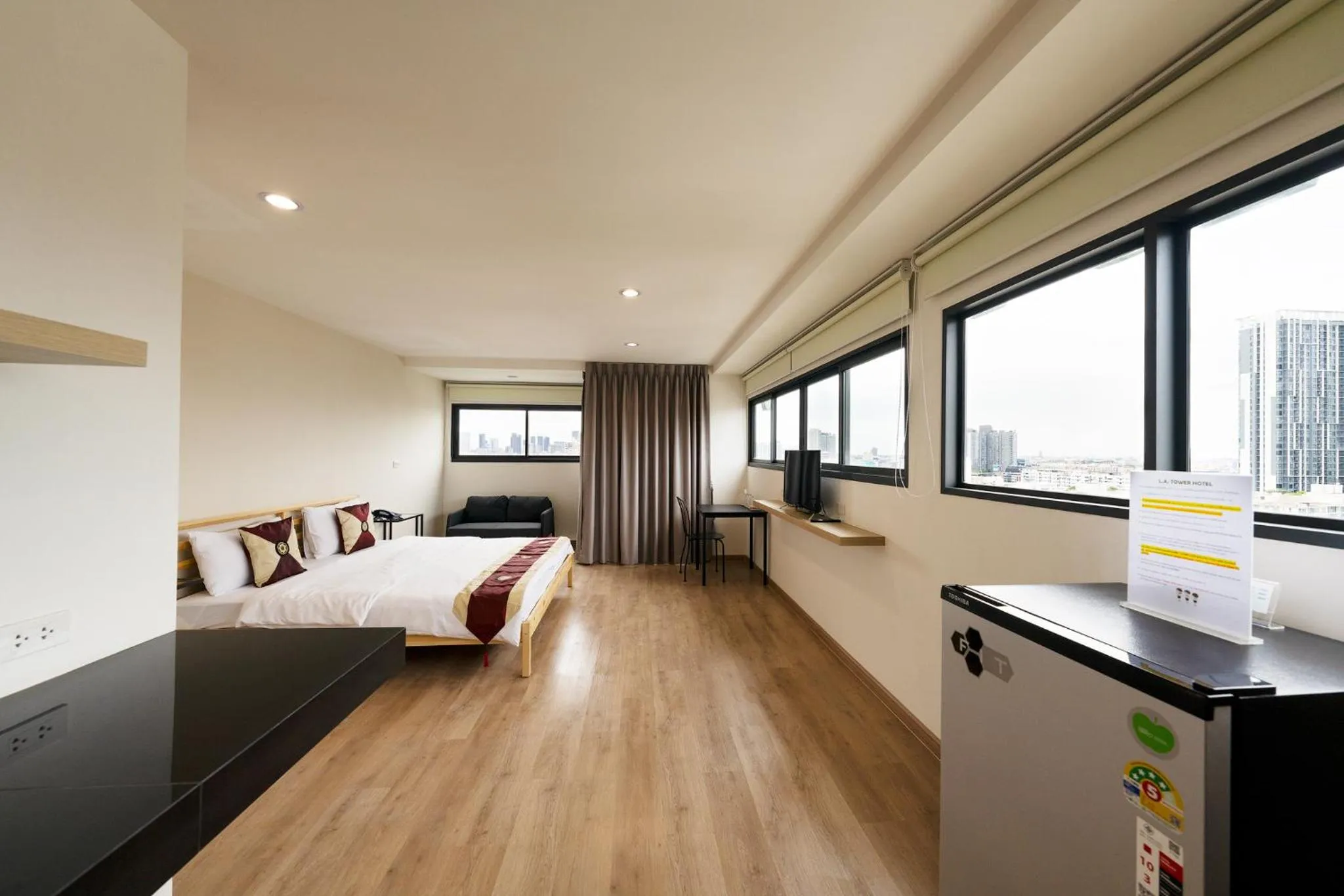 Photo of the whole room, Bed in L.A. Tower Hotel