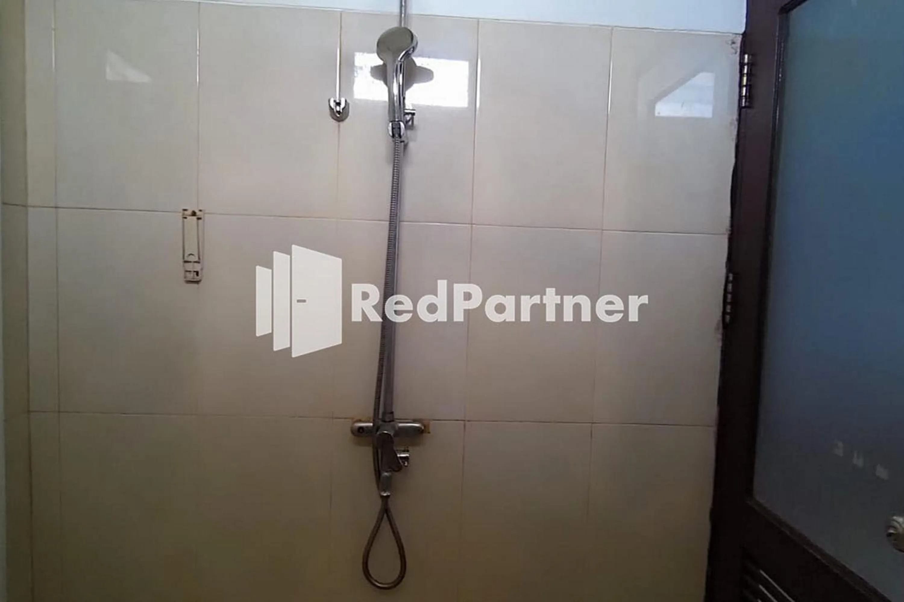 Bathroom in Hotel Abna Sangatta Mitra RedDoorz