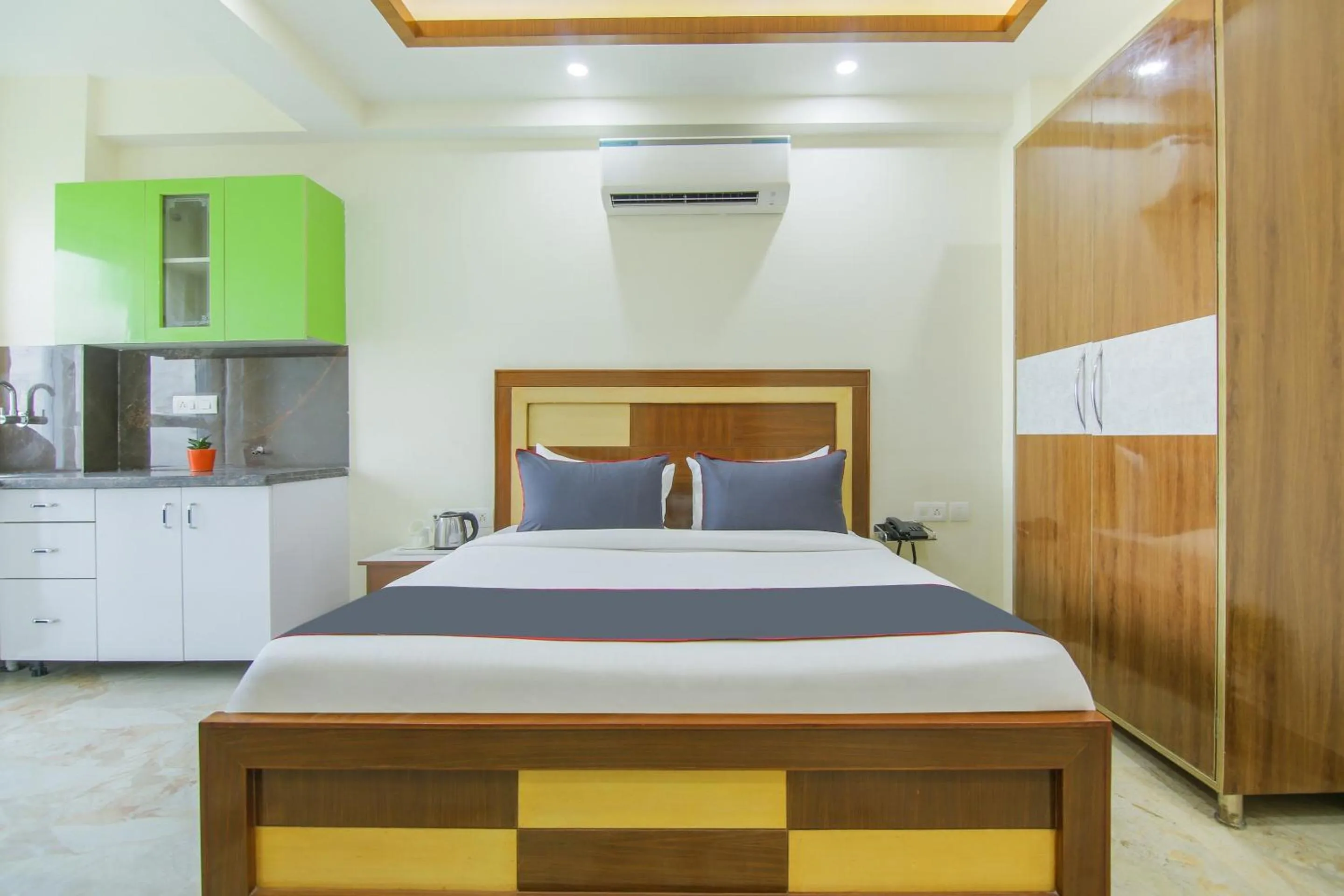 Bedroom, Bed in Collection O Corporate Suite Near Omaxe Celebration Mall