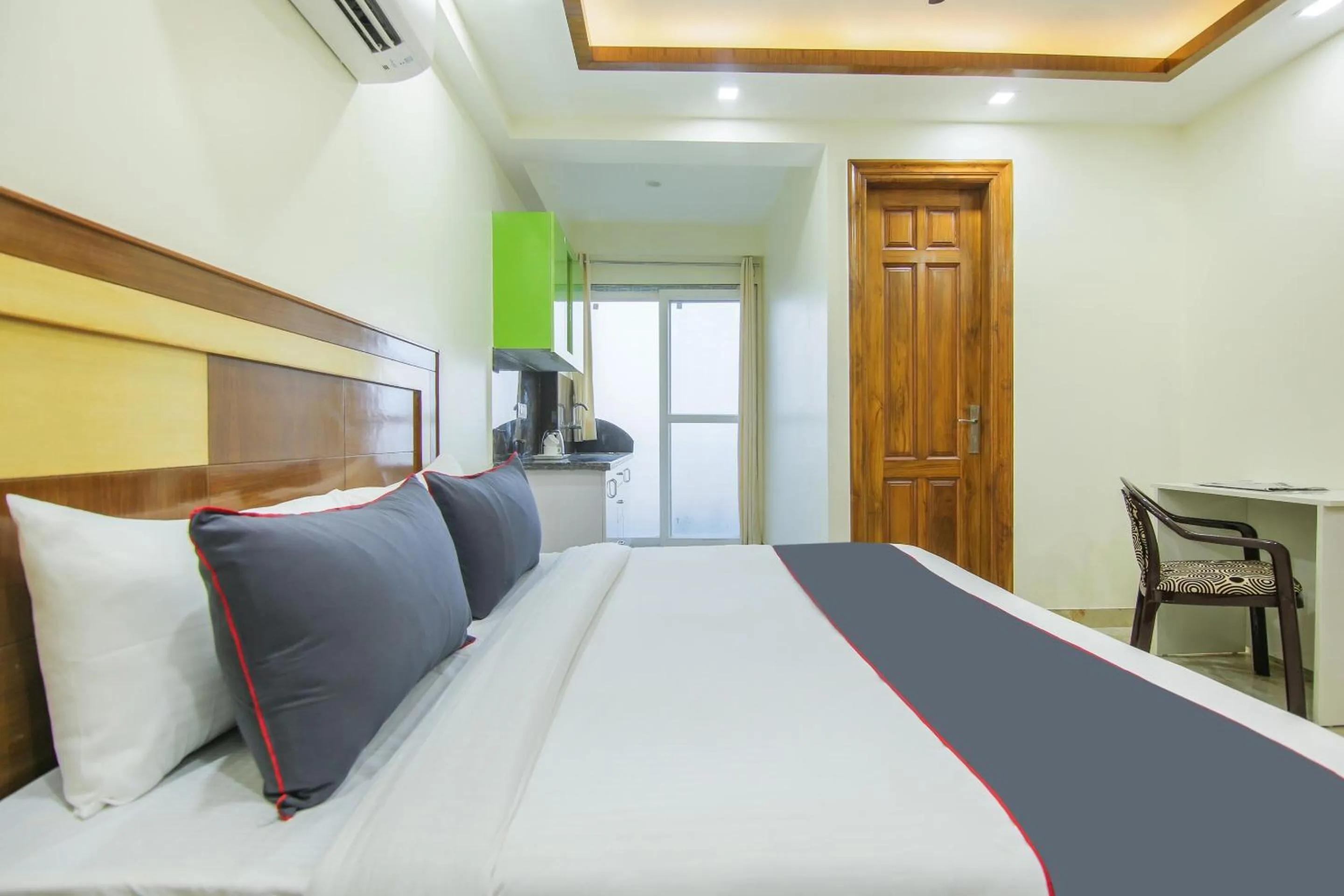 Bedroom, Bed in Collection O Corporate Suite Near Omaxe Celebration Mall