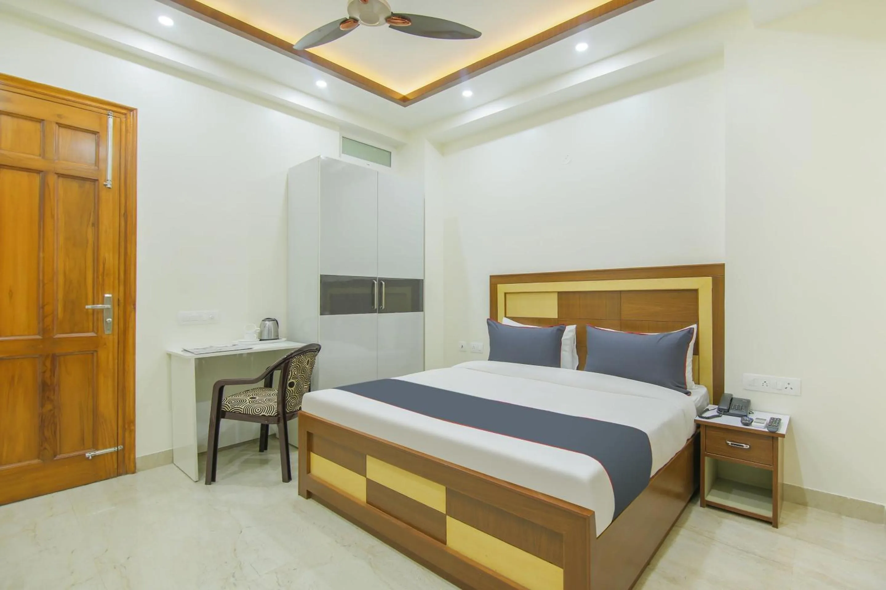 Bedroom, Bed in Collection O Corporate Suite Near Omaxe Celebration Mall