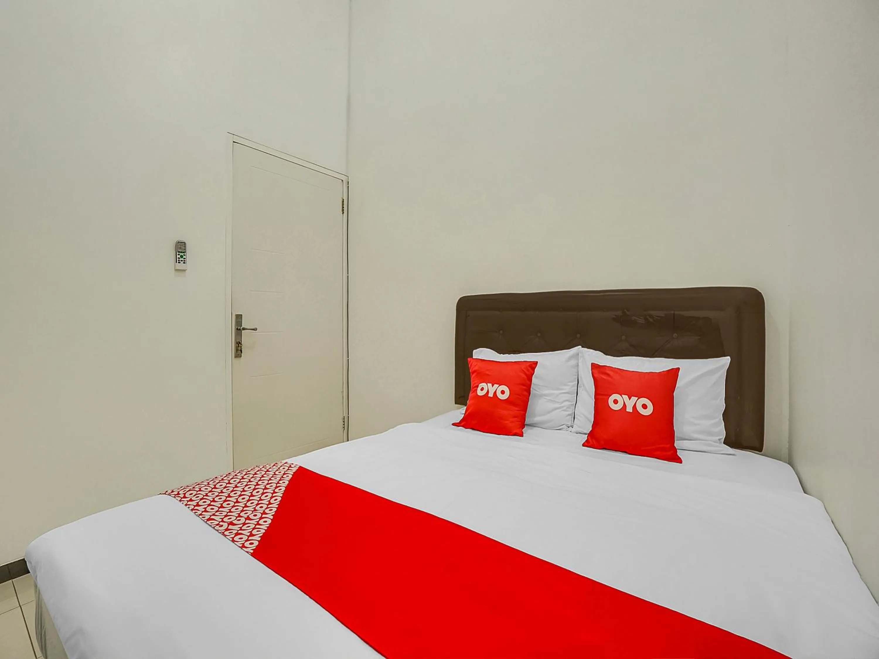 Bedroom, Bed in Hotel O Happy Homestay Syariah