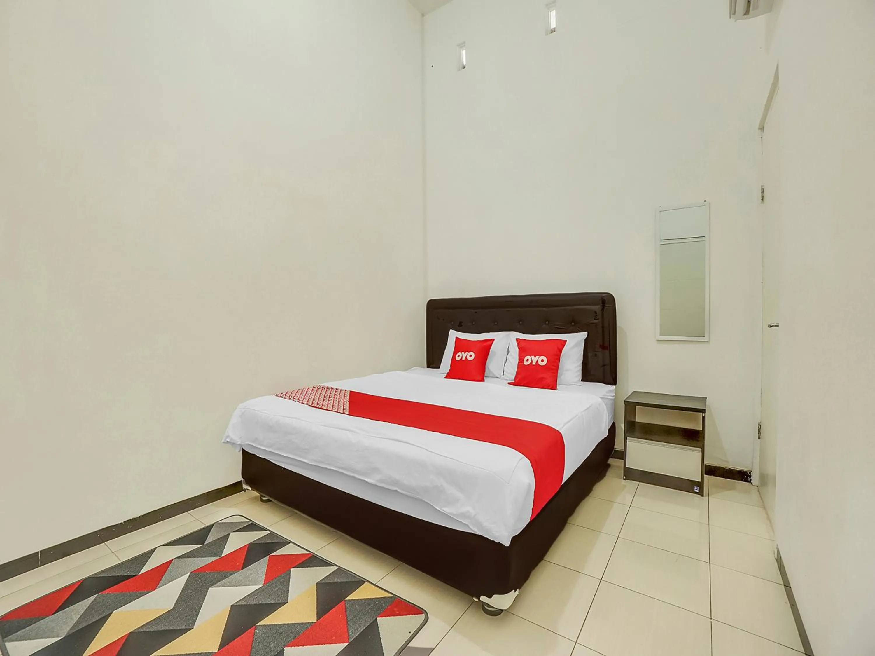 Bedroom, Bed in Hotel O Happy Homestay Syariah