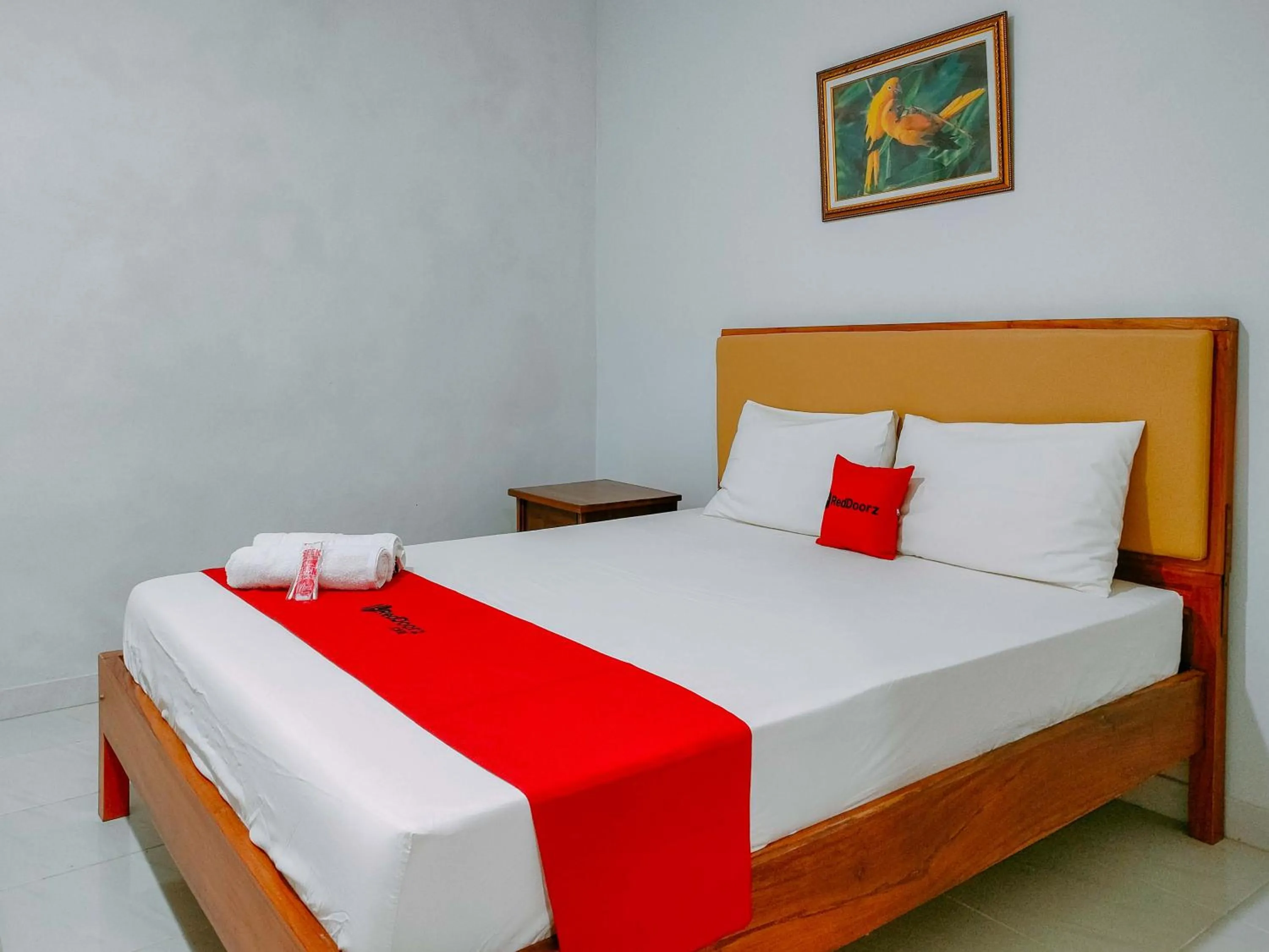 Bed in RedDoorz at Omah Candi Sari near Airport YIA