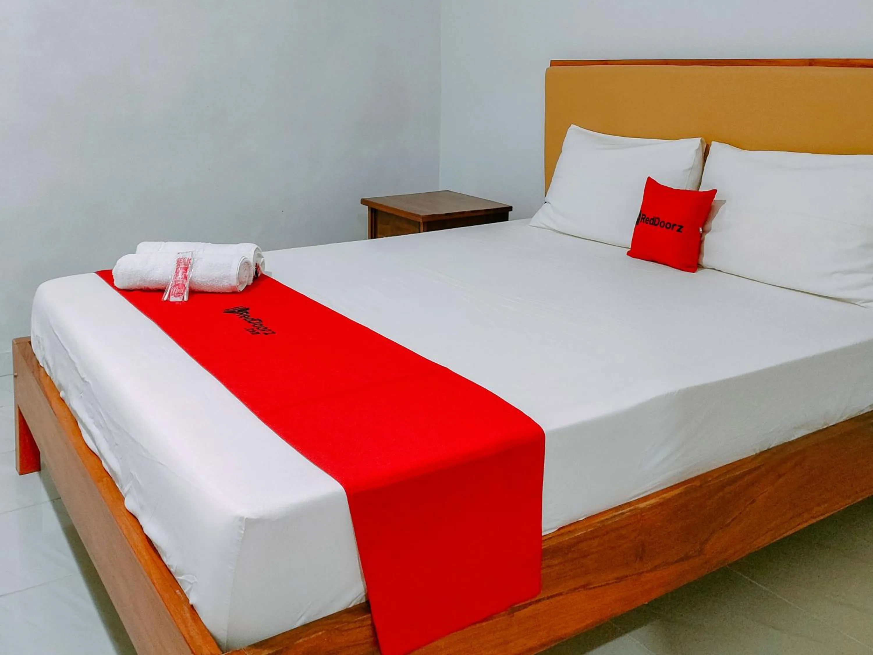 Bed in RedDoorz at Omah Candi Sari near Airport YIA