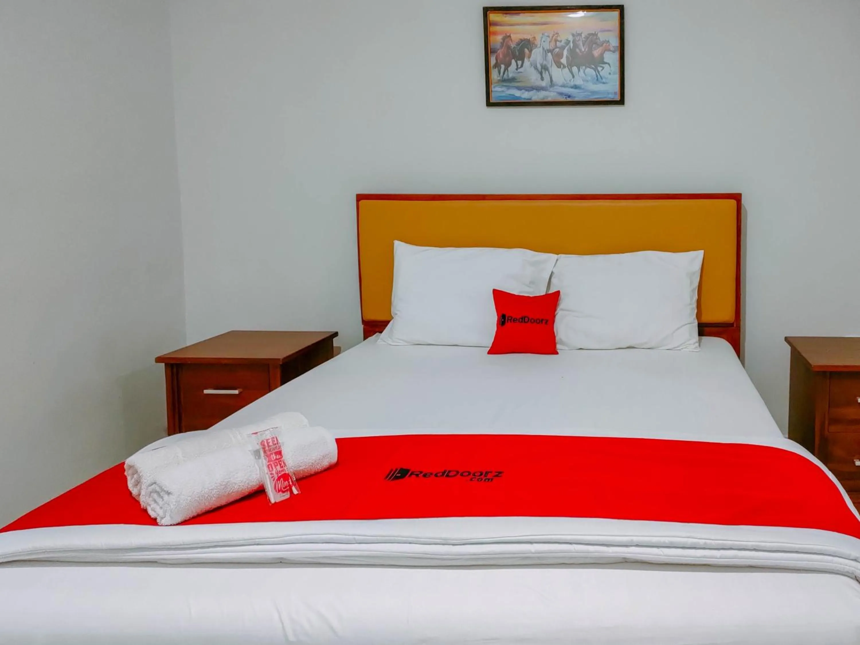 Bed in RedDoorz at Omah Candi Sari near Airport YIA
