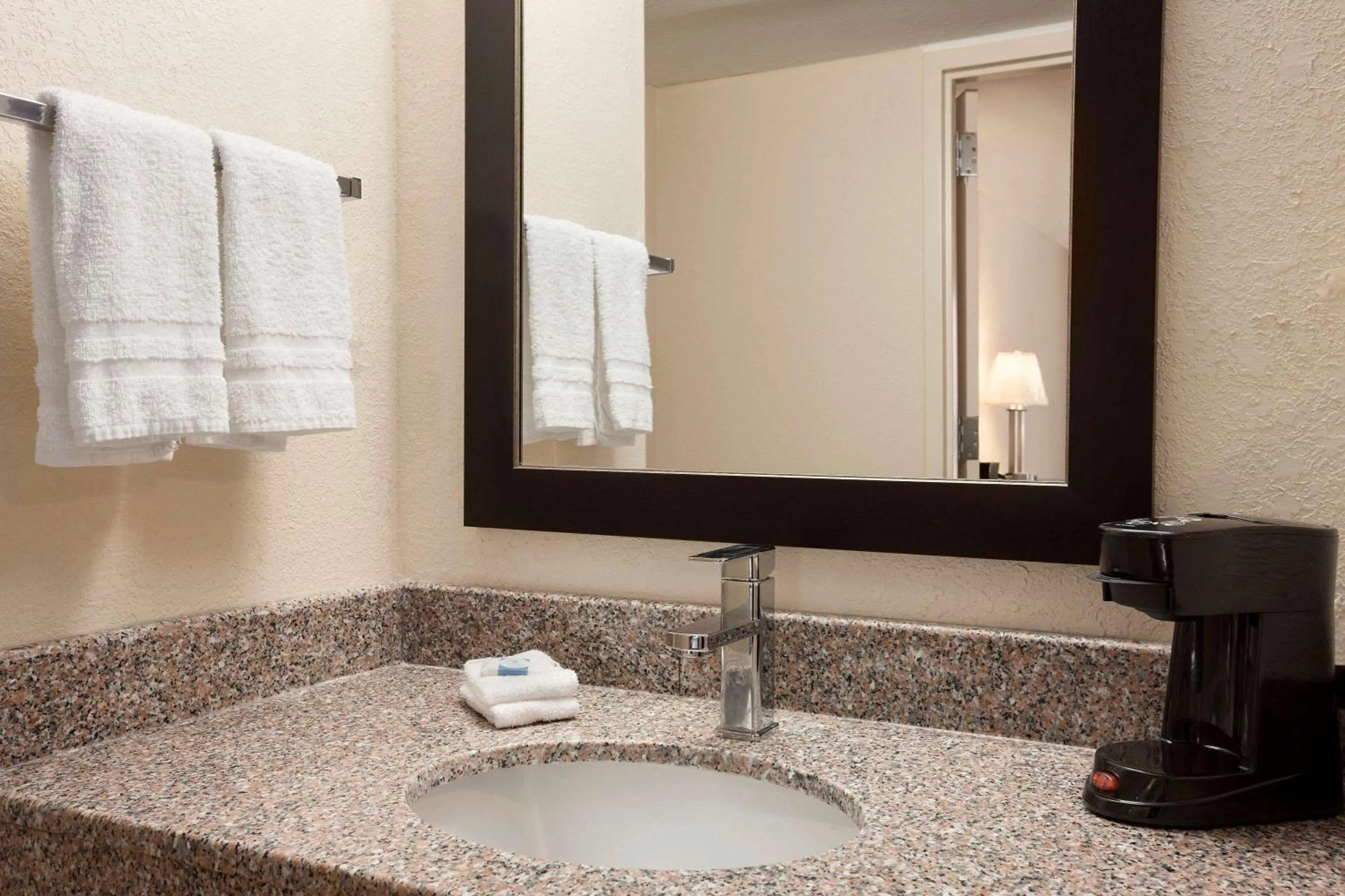 Bathroom in Super 8 by Wyndham Rahway/Newark