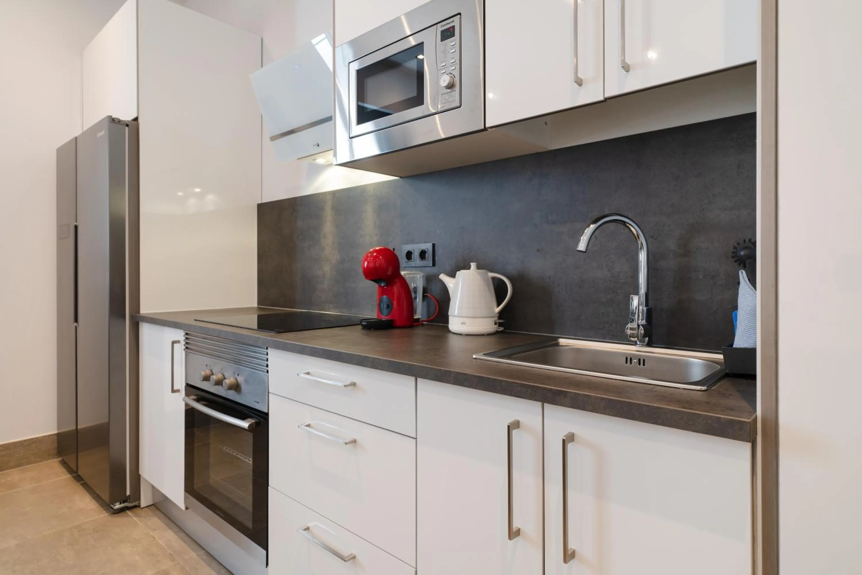 kitchen in Sabbia Suites La Armada