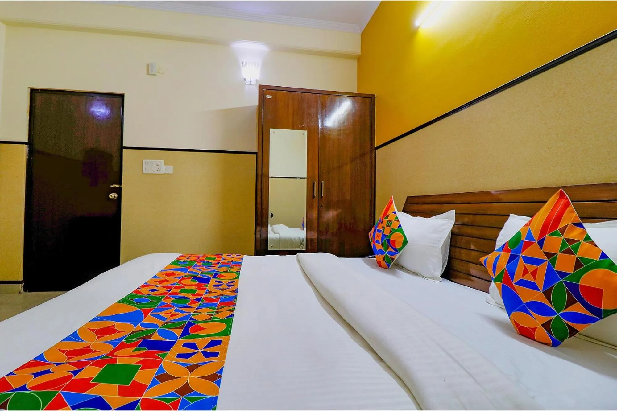 Bed in FabHotel Elite Peak