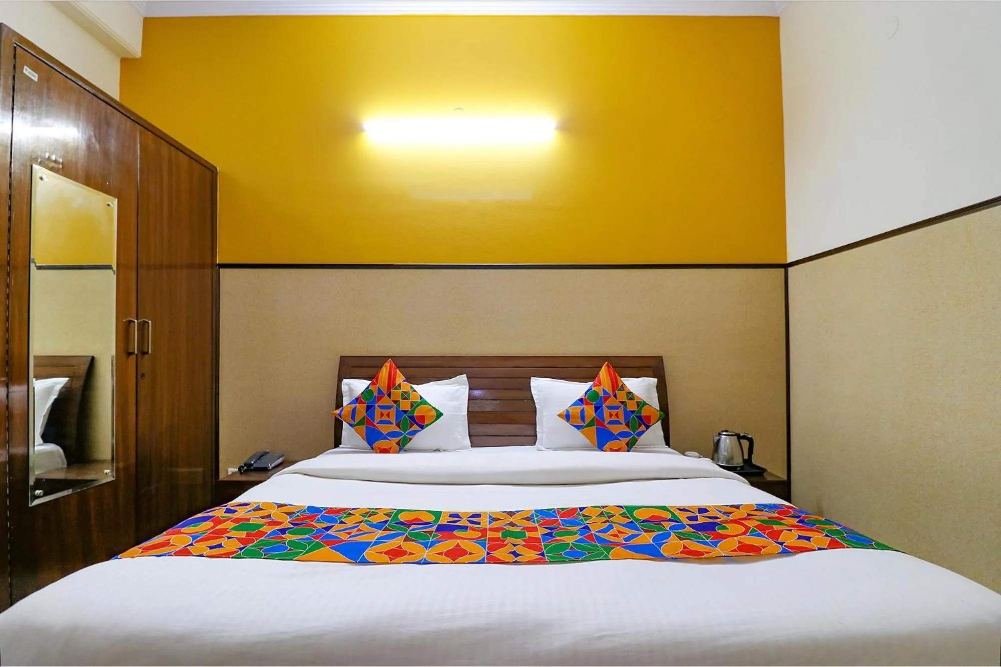 Bed in FabHotel Elite Peak